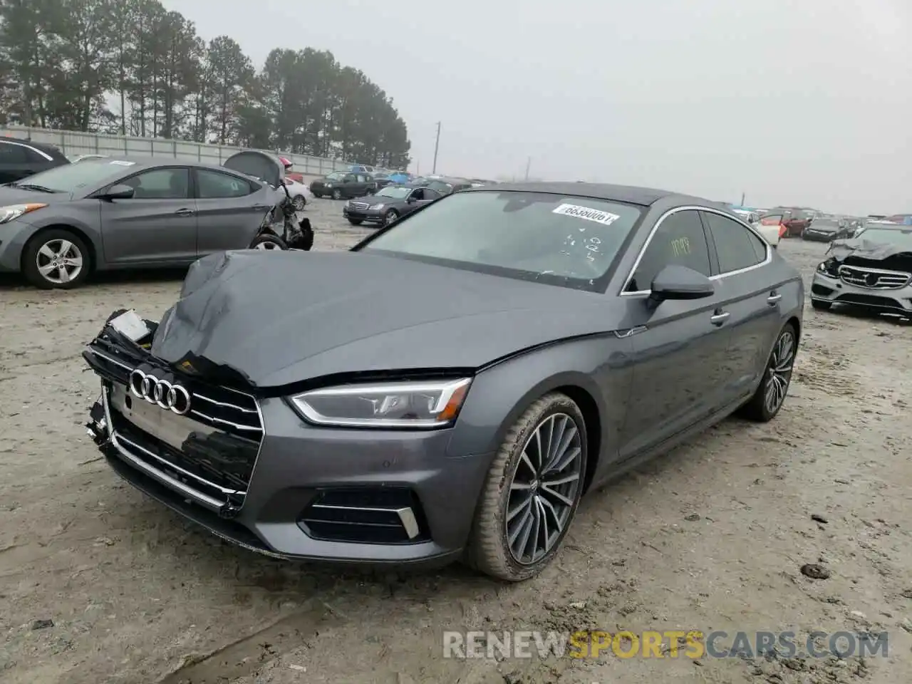 2 Photograph of a damaged car WAUBNCF54KA071002 AUDI A5 2019