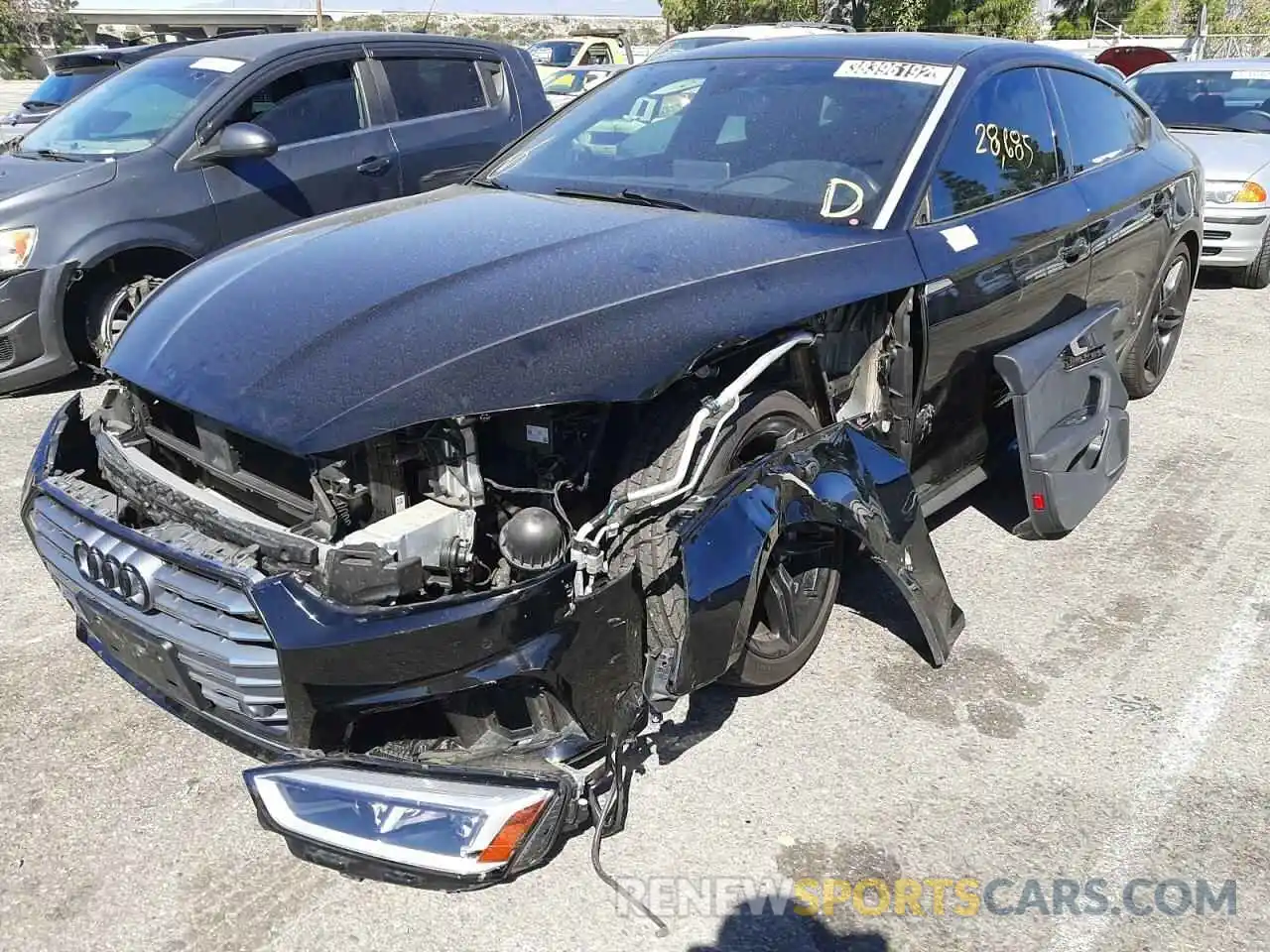 2 Photograph of a damaged car WAUENCF55KA024719 AUDI A5 2019