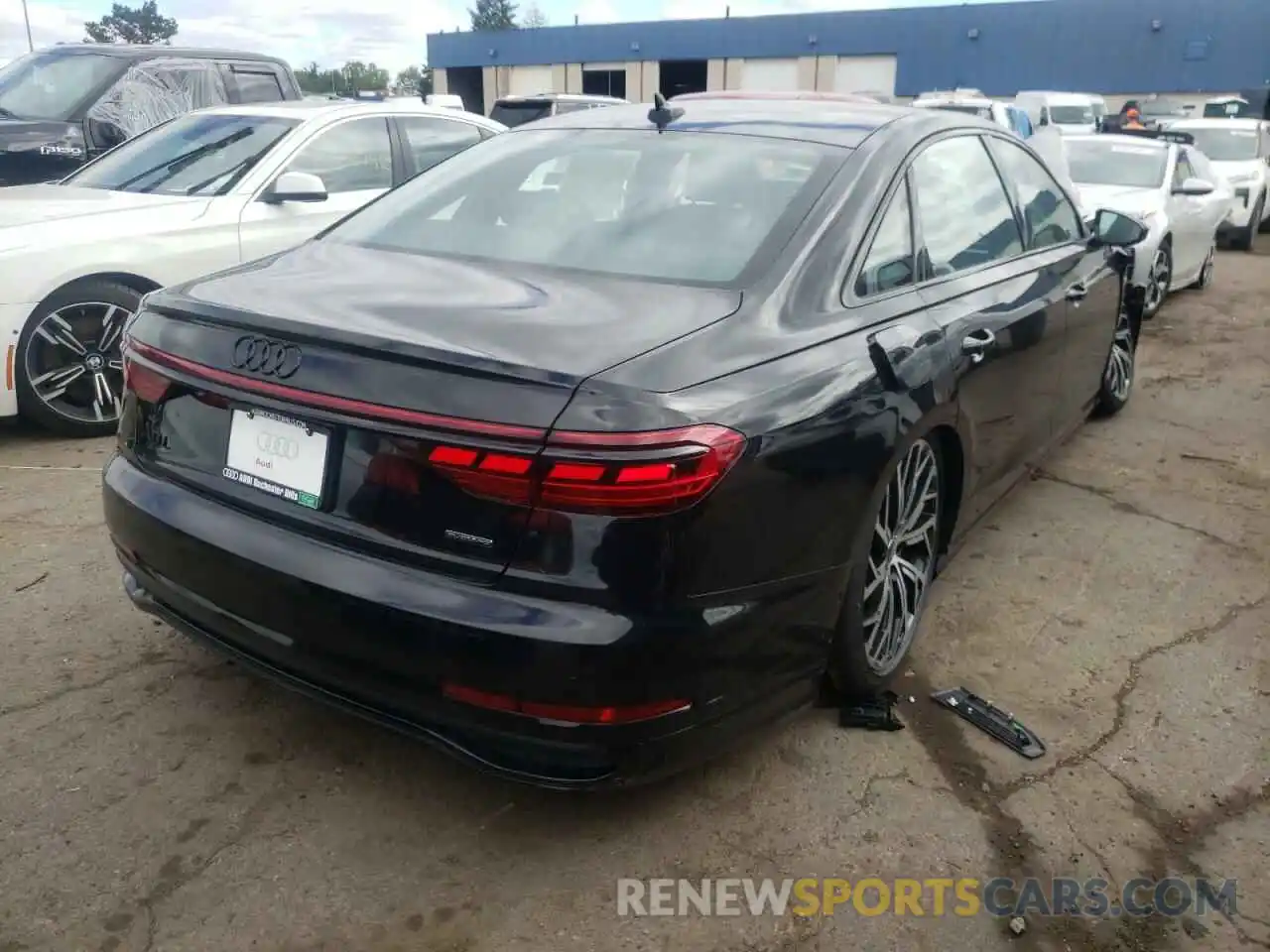 4 Photograph of a damaged car WAULDAF83NN006371 AUDI A8 2022