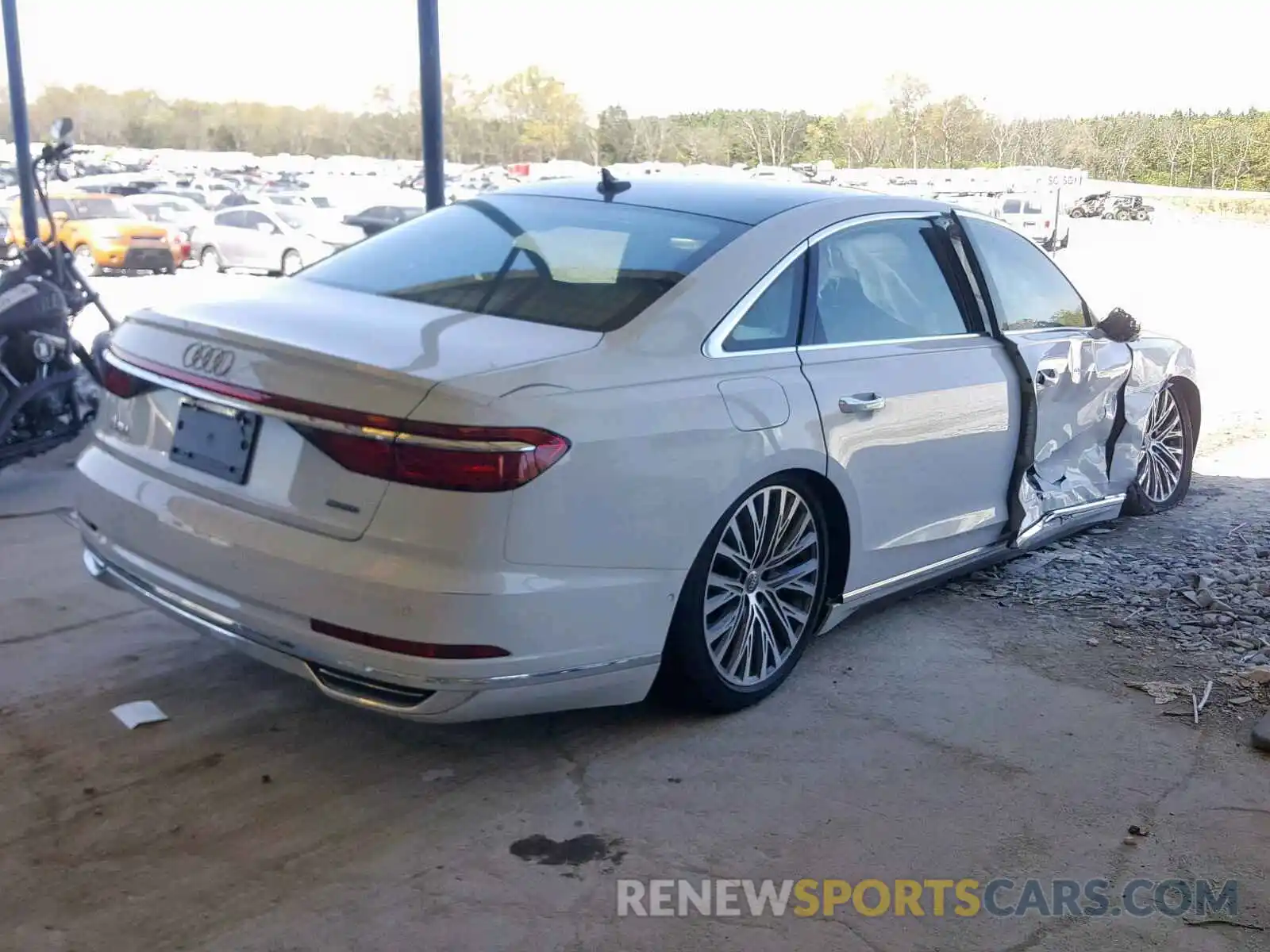 4 Фотография поврежденного автомобиля WAU8DAF87KN010876 AUDI A8 L 2019