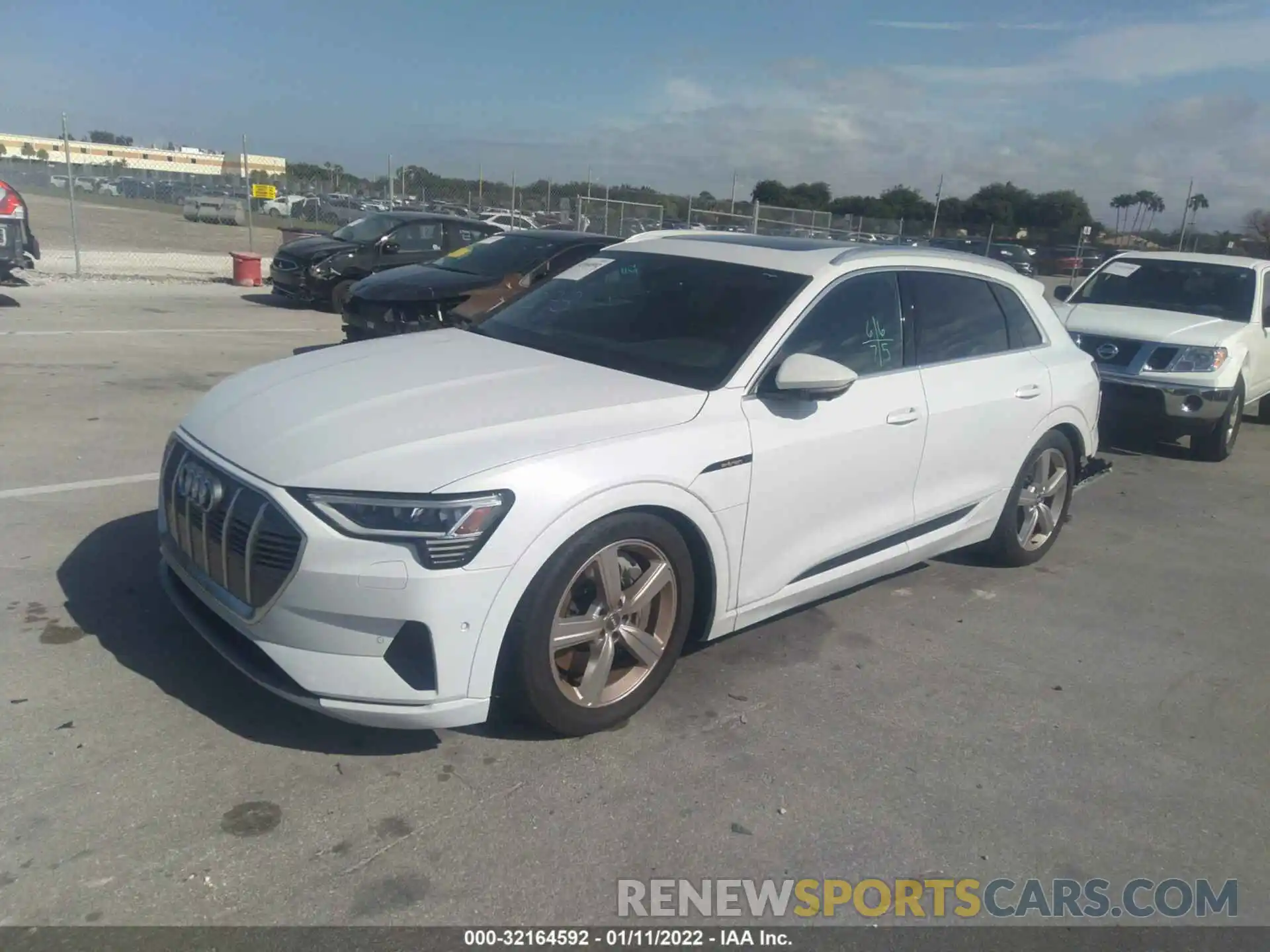 2 Photograph of a damaged car WA1LAAGE6KB024273 AUDI E-TRON 2019