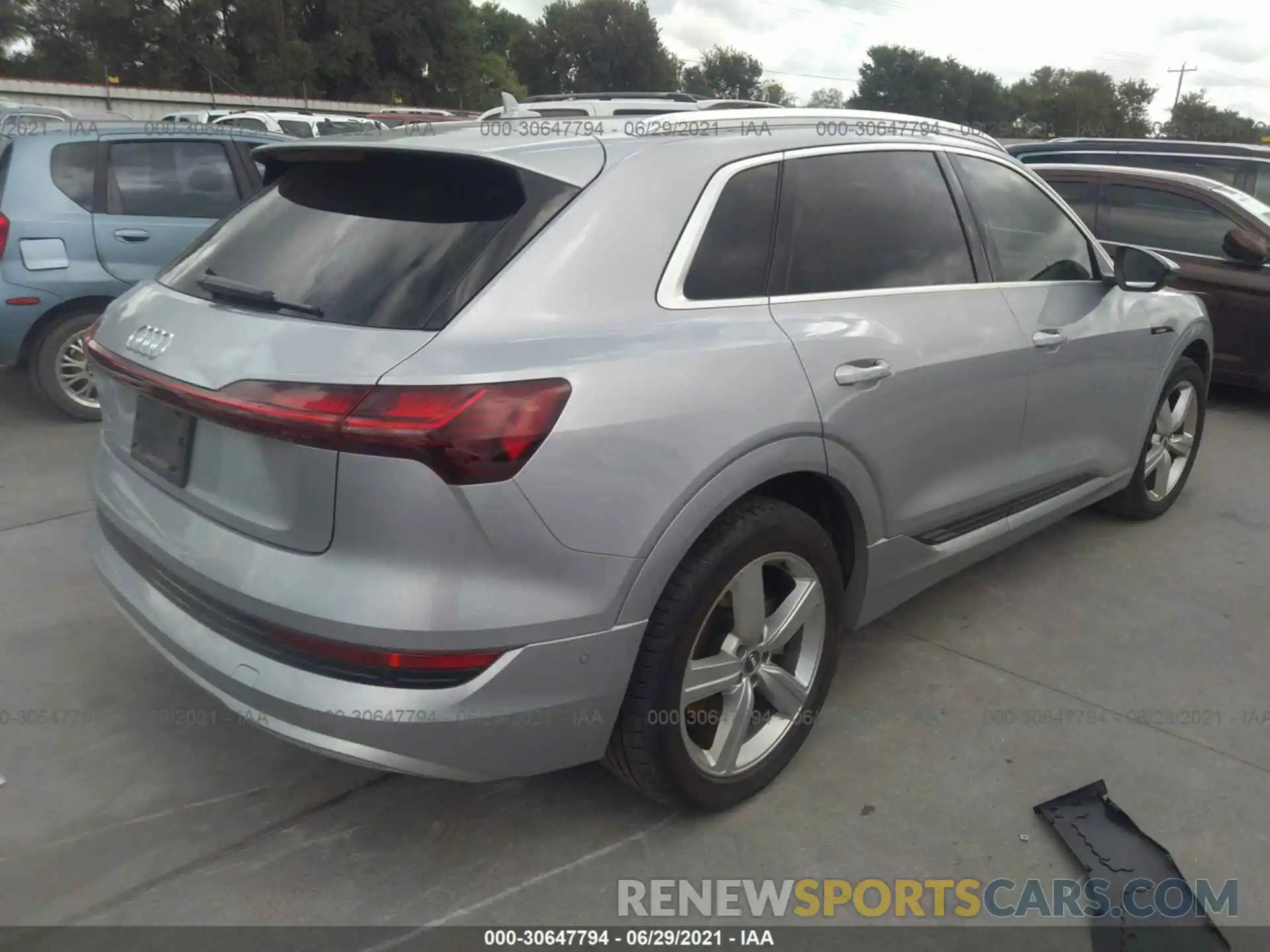 4 Photograph of a damaged car WA1LAAGE7KB020412 AUDI E-TRON 2019