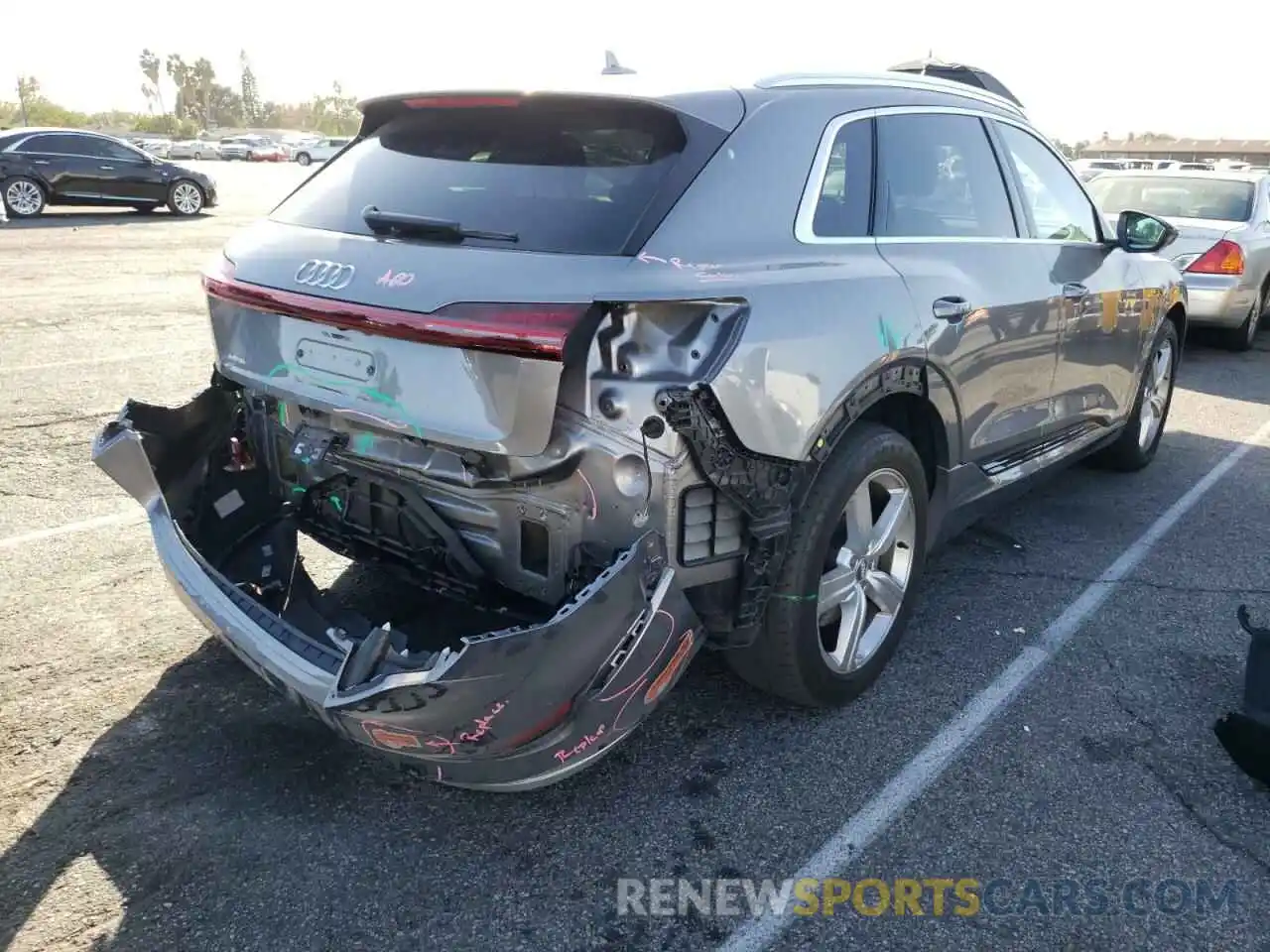 4 Photograph of a damaged car WA1LAAGE9KB017303 AUDI E-TRON 2019