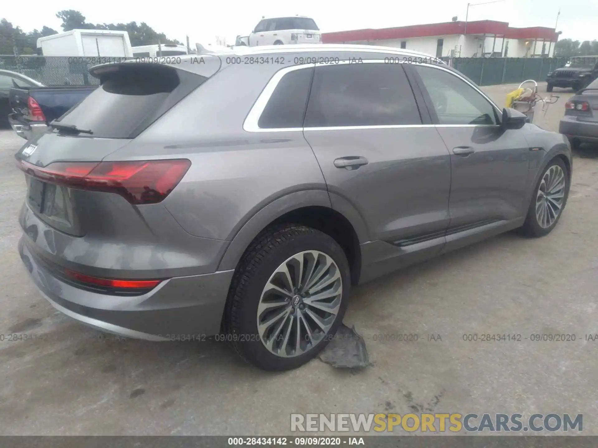 4 Photograph of a damaged car WA1VAAGE3KB008136 AUDI E-TRON 2019