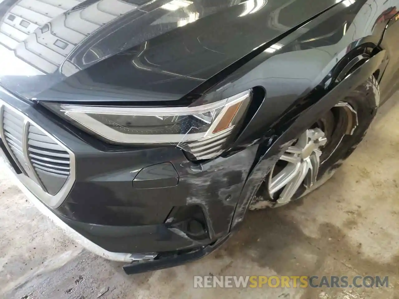 9 Photograph of a damaged car WA1VAAGE6KB012410 AUDI E-TRON 2019