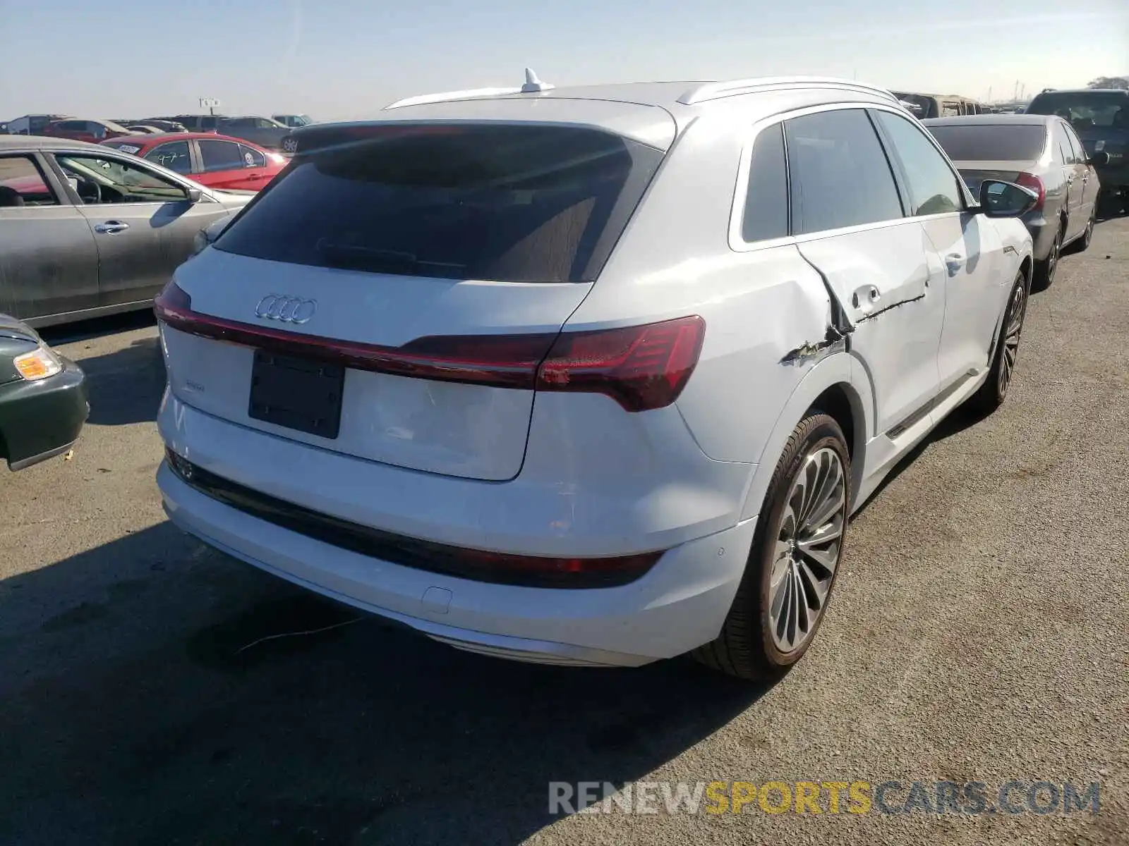 4 Photograph of a damaged car WA1VAAGEXKB005928 AUDI E-TRON 2019