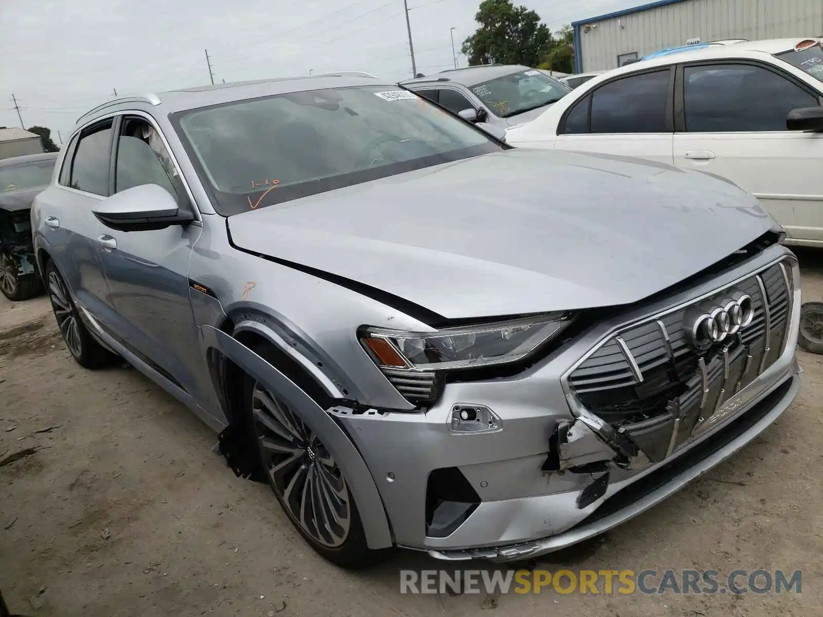 1 Photograph of a damaged car WA1VABGE1KB022106 AUDI E-TRON 2019