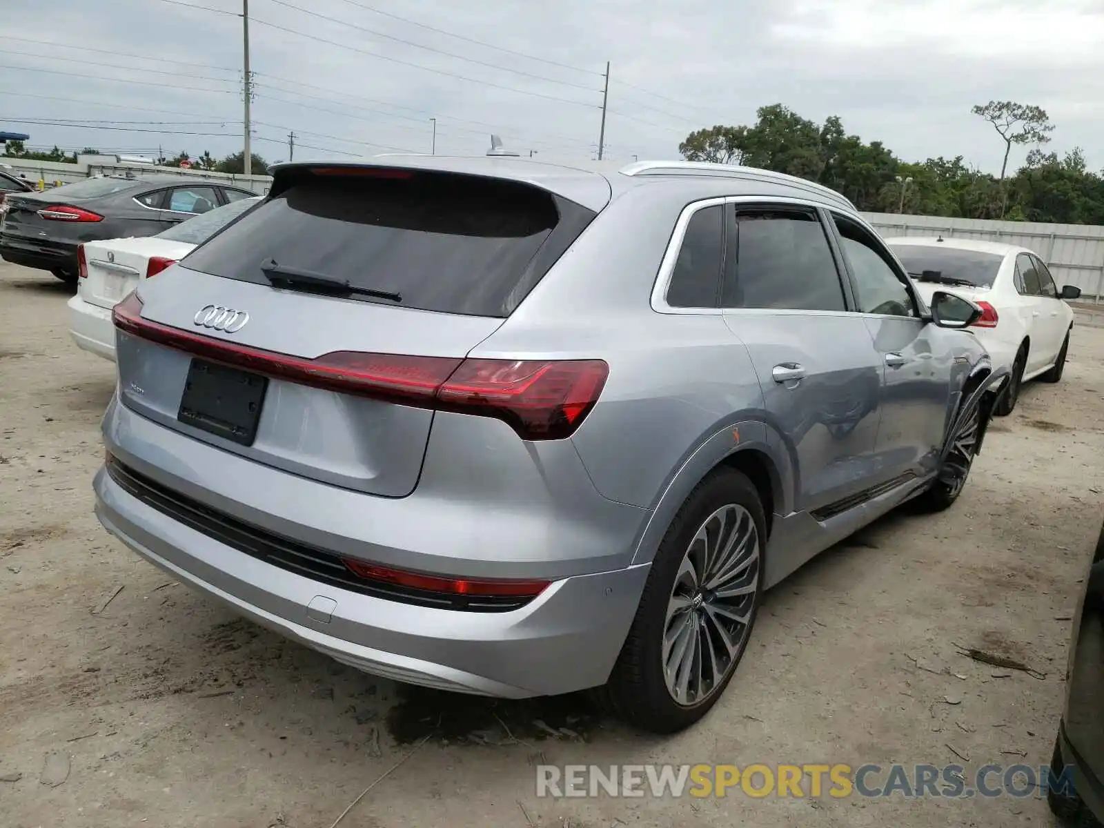 4 Photograph of a damaged car WA1VABGE1KB022106 AUDI E-TRON 2019