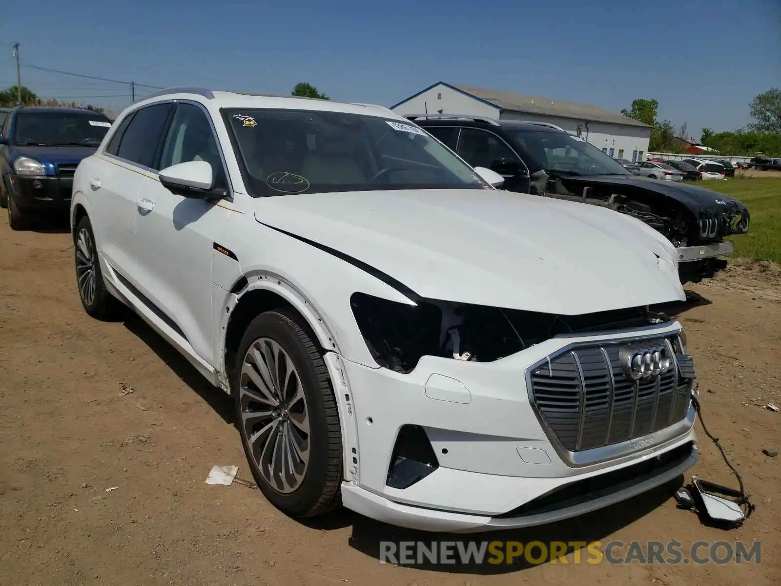 1 Photograph of a damaged car WA1VABGE2KB021353 AUDI E-TRON 2019