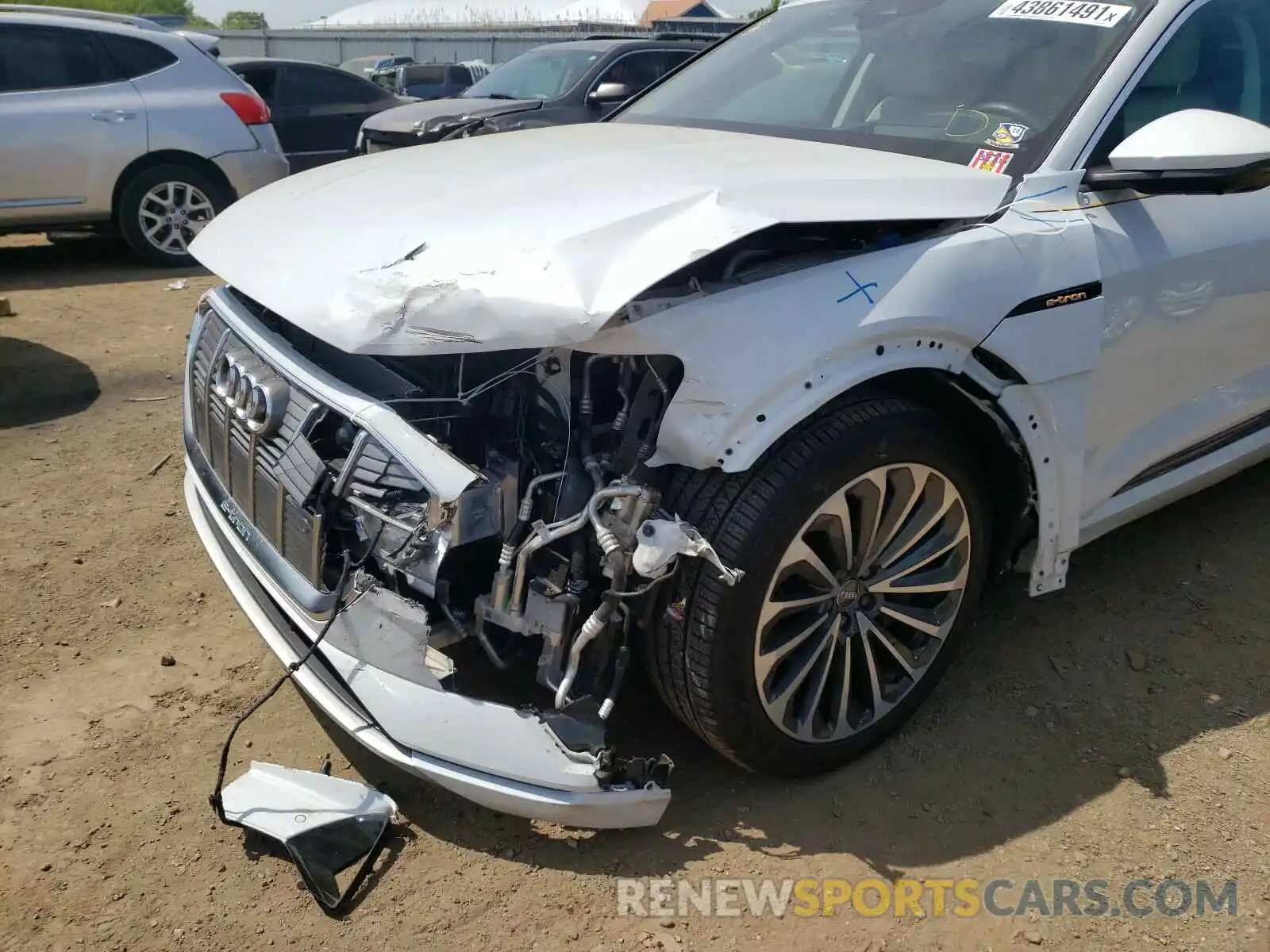 9 Photograph of a damaged car WA1VABGE2KB021353 AUDI E-TRON 2019