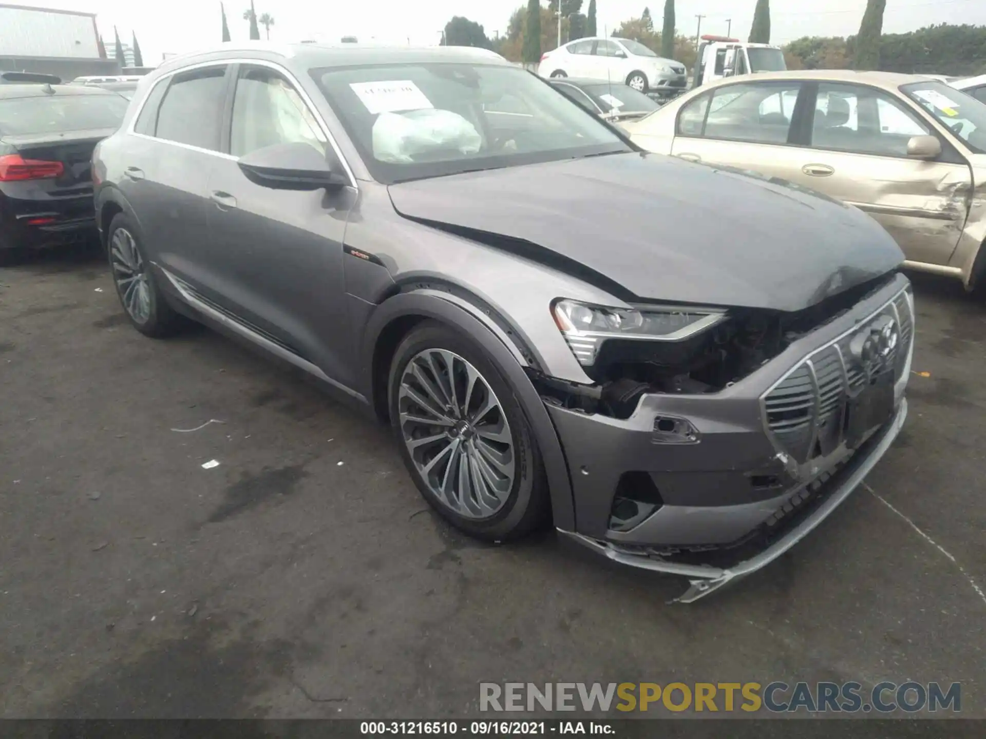 1 Photograph of a damaged car WA1VABGE5KB014865 AUDI E-TRON 2019