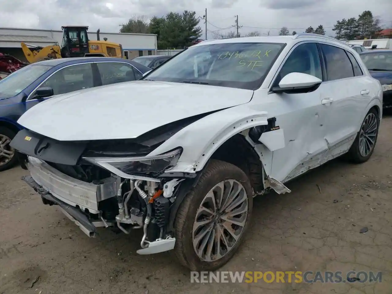 2 Photograph of a damaged car WA1VABGE6KB009335 AUDI E-TRON 2019