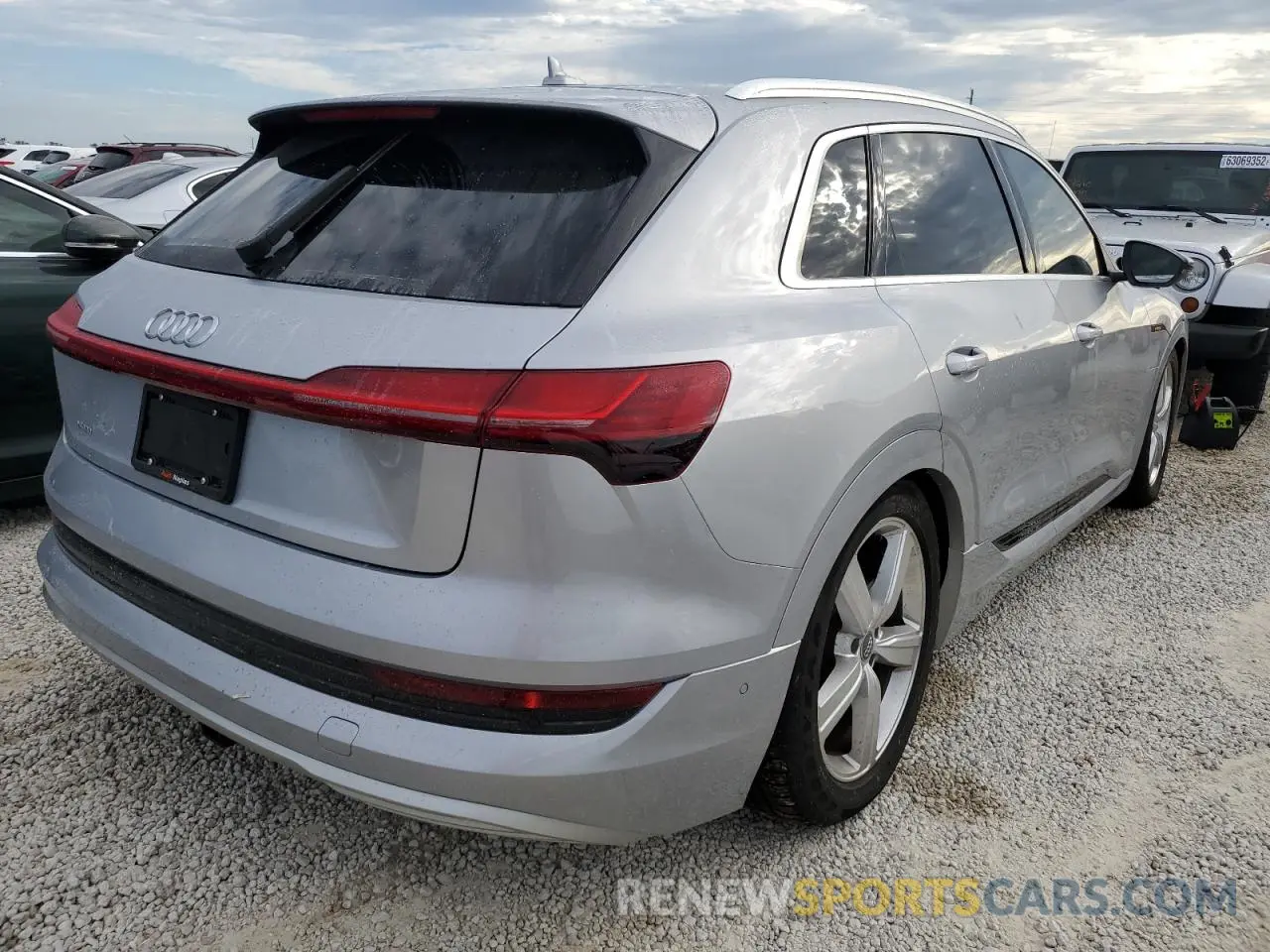 4 Photograph of a damaged car WA1VABGE7KB013572 AUDI E-TRON 2019