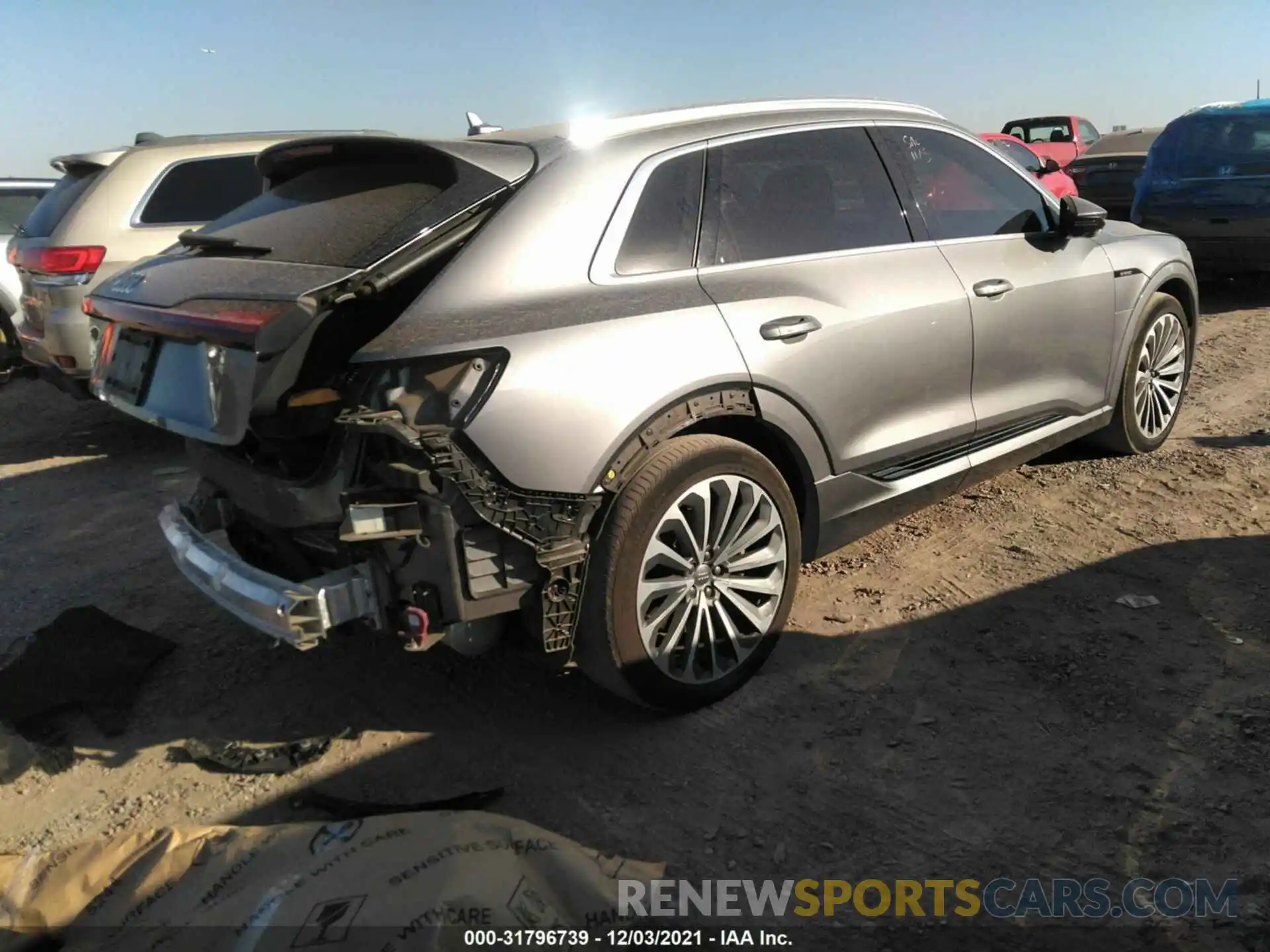 4 Photograph of a damaged car WA1VABGE8KB017095 AUDI E-TRON 2019