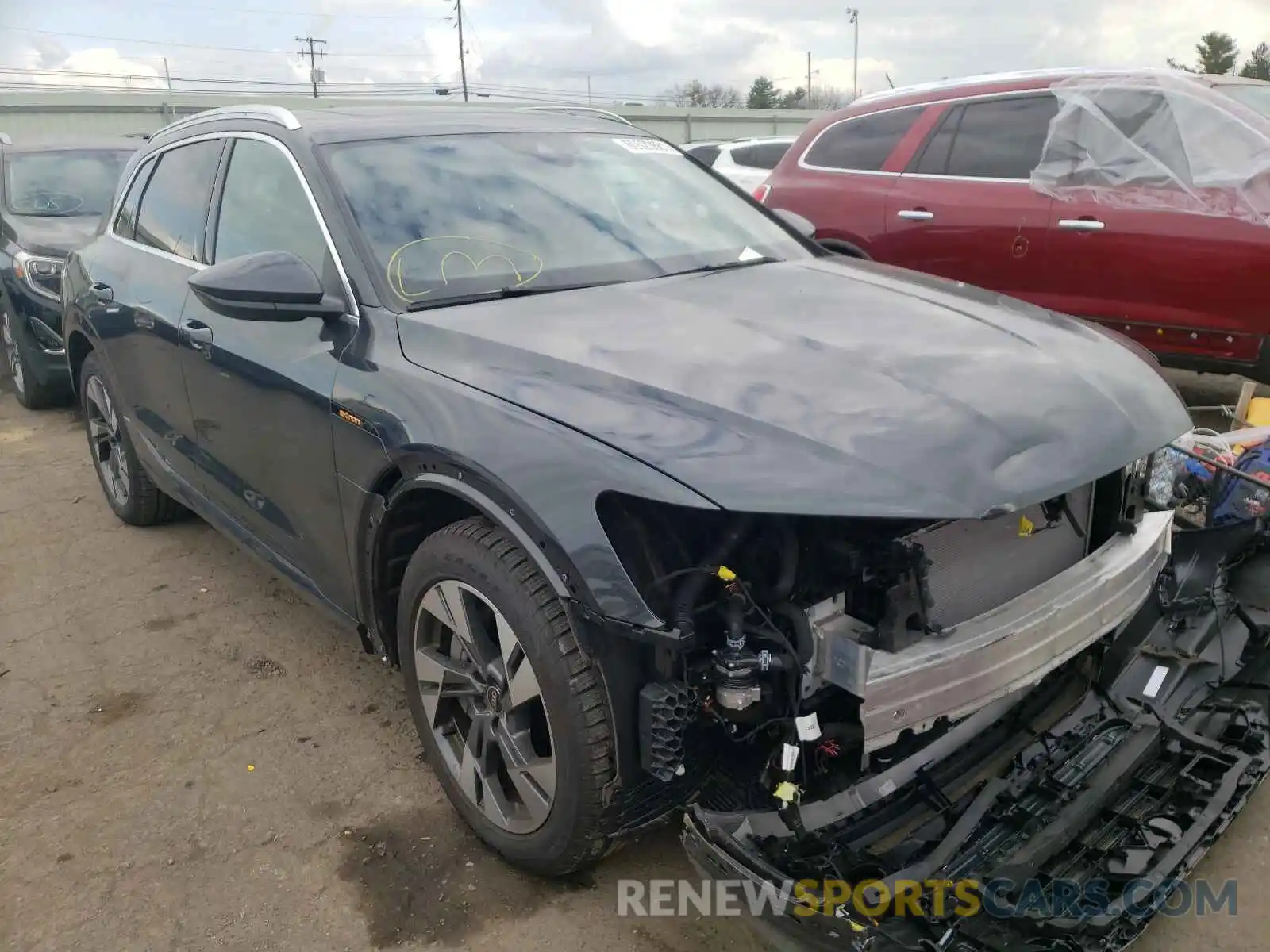 1 Photograph of a damaged car WA1AAAGE2MB008128 AUDI E-TRON 2021