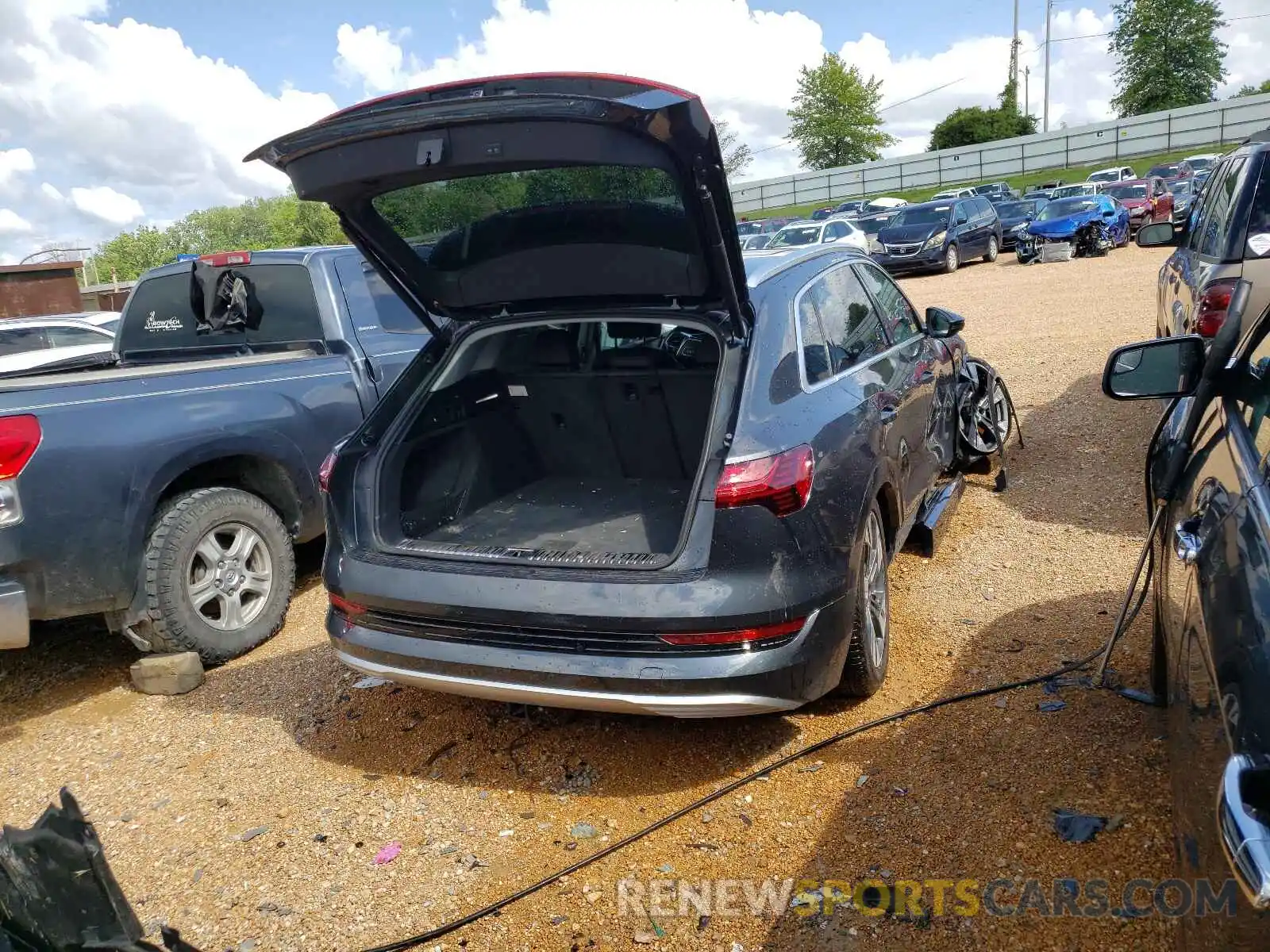 4 Photograph of a damaged car WA1AAAGE3MB025925 AUDI E-TRON 2021