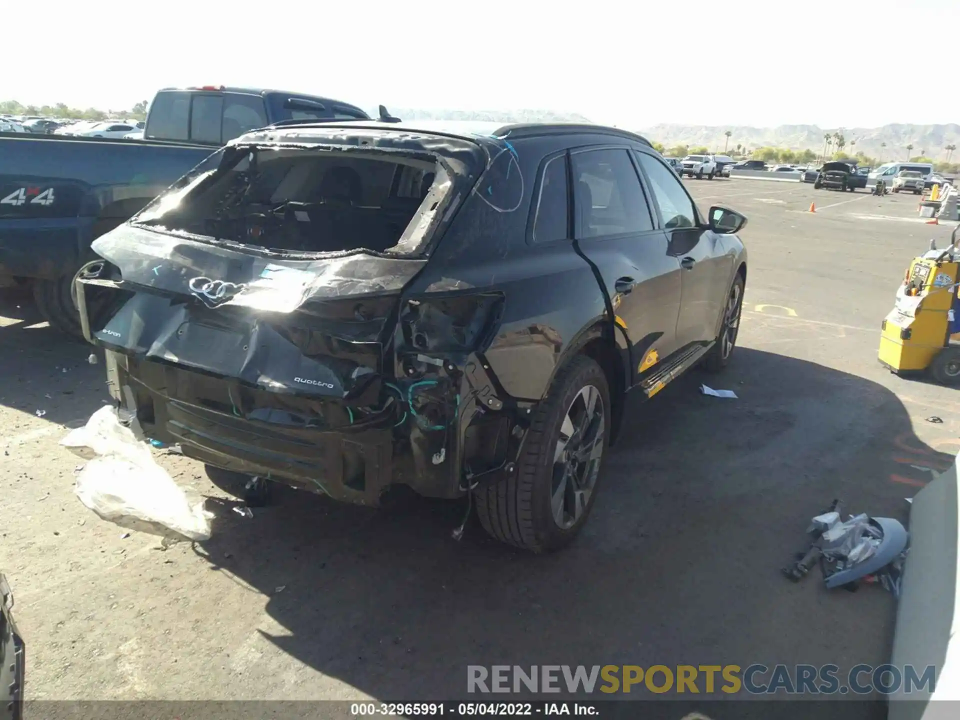 4 Photograph of a damaged car WA1AAAGE4MB006994 AUDI E-TRON 2021