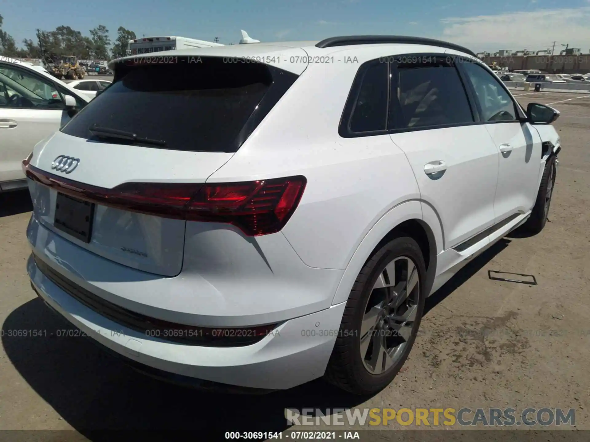 4 Photograph of a damaged car WA1AAAGE5MB013274 AUDI E-TRON 2021