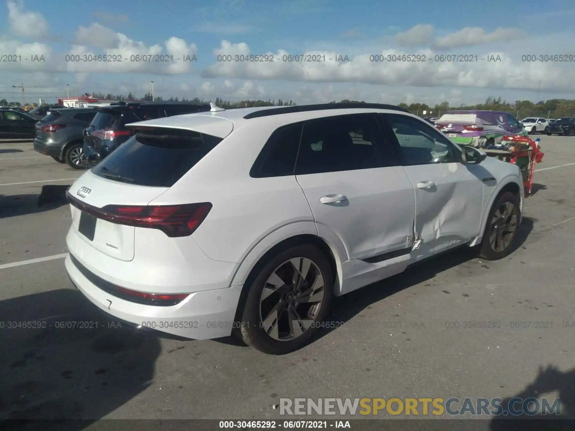 4 Photograph of a damaged car WA1AAAGE9MB009597 AUDI E-TRON 2021