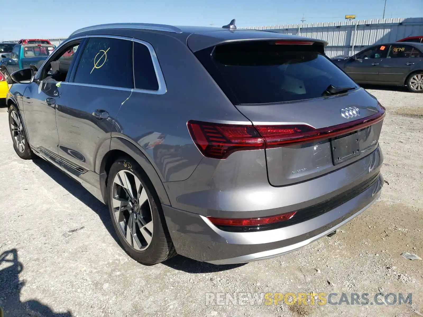 3 Photograph of a damaged car WA1AAAGE9MB014833 AUDI E-TRON 2021