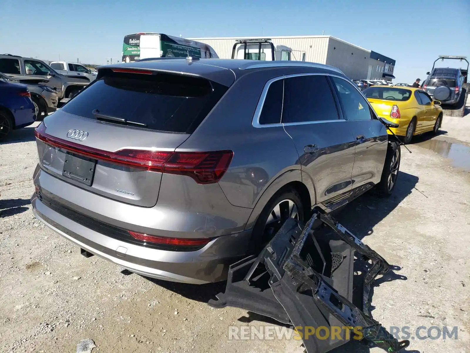 4 Photograph of a damaged car WA1AAAGE9MB014833 AUDI E-TRON 2021