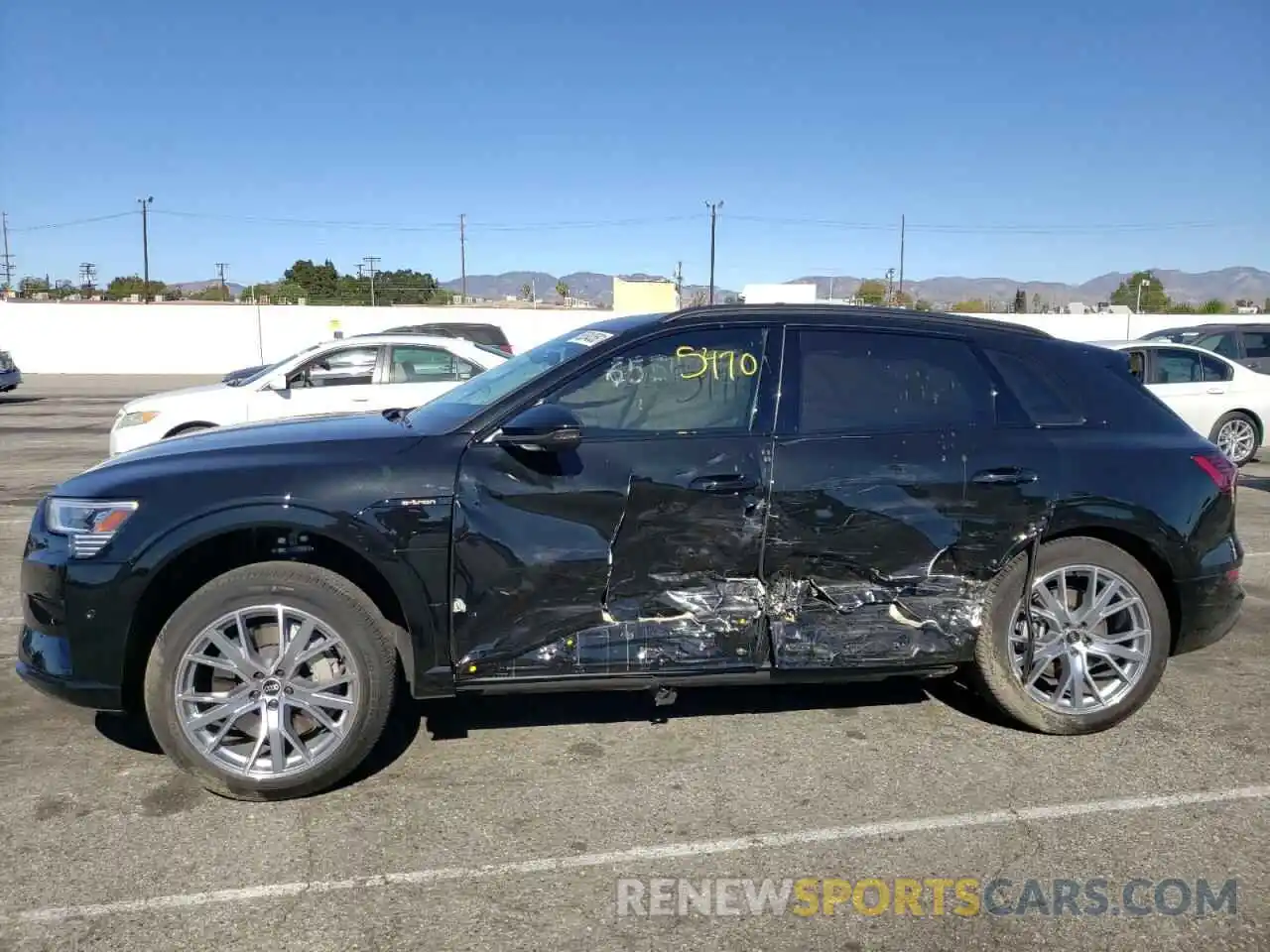 9 Photograph of a damaged car WA1VAAGE8MB036999 AUDI E-TRON 2021