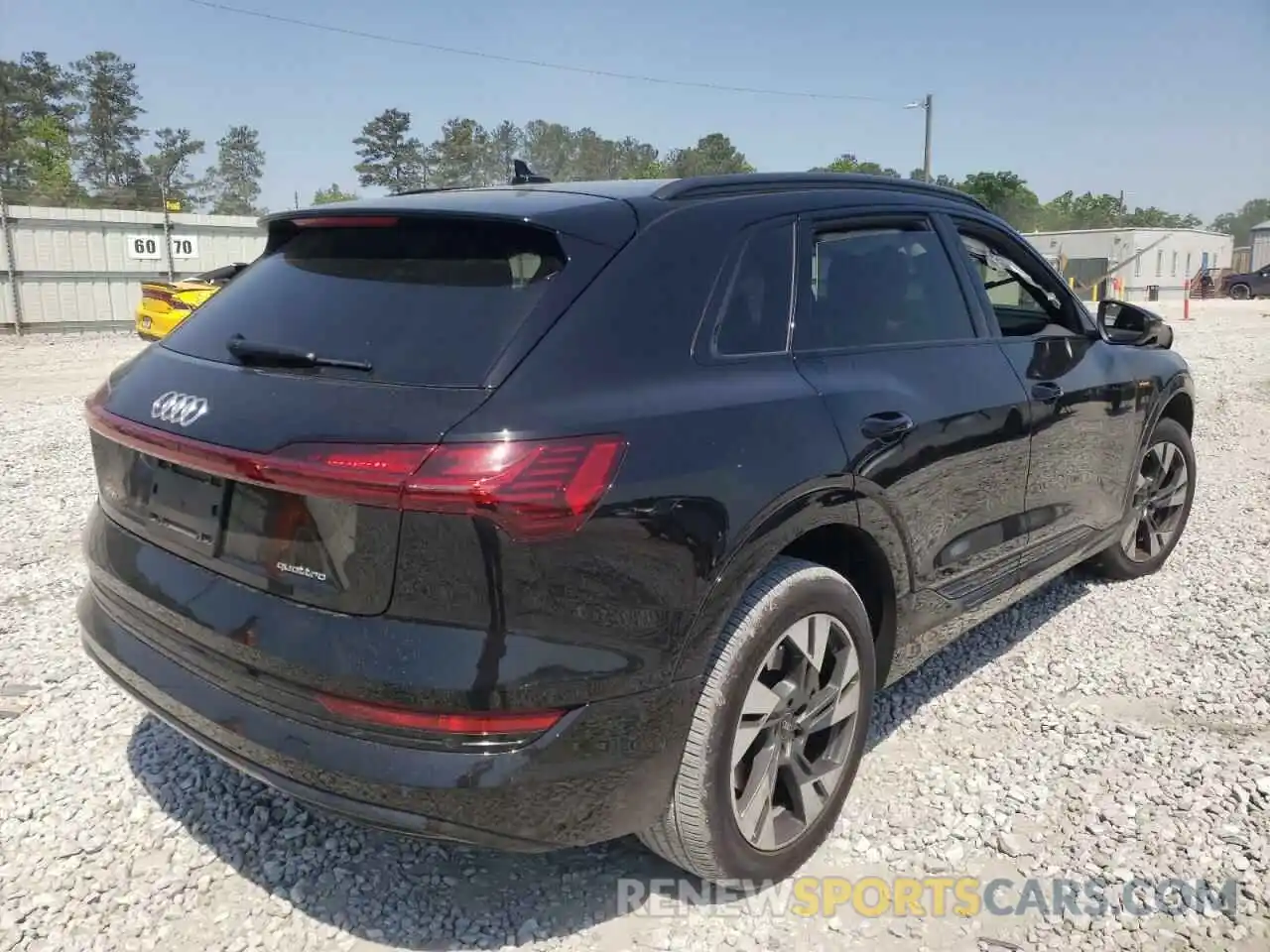 4 Photograph of a damaged car WA1AAAGE8NB006028 AUDI E-TRON 2022