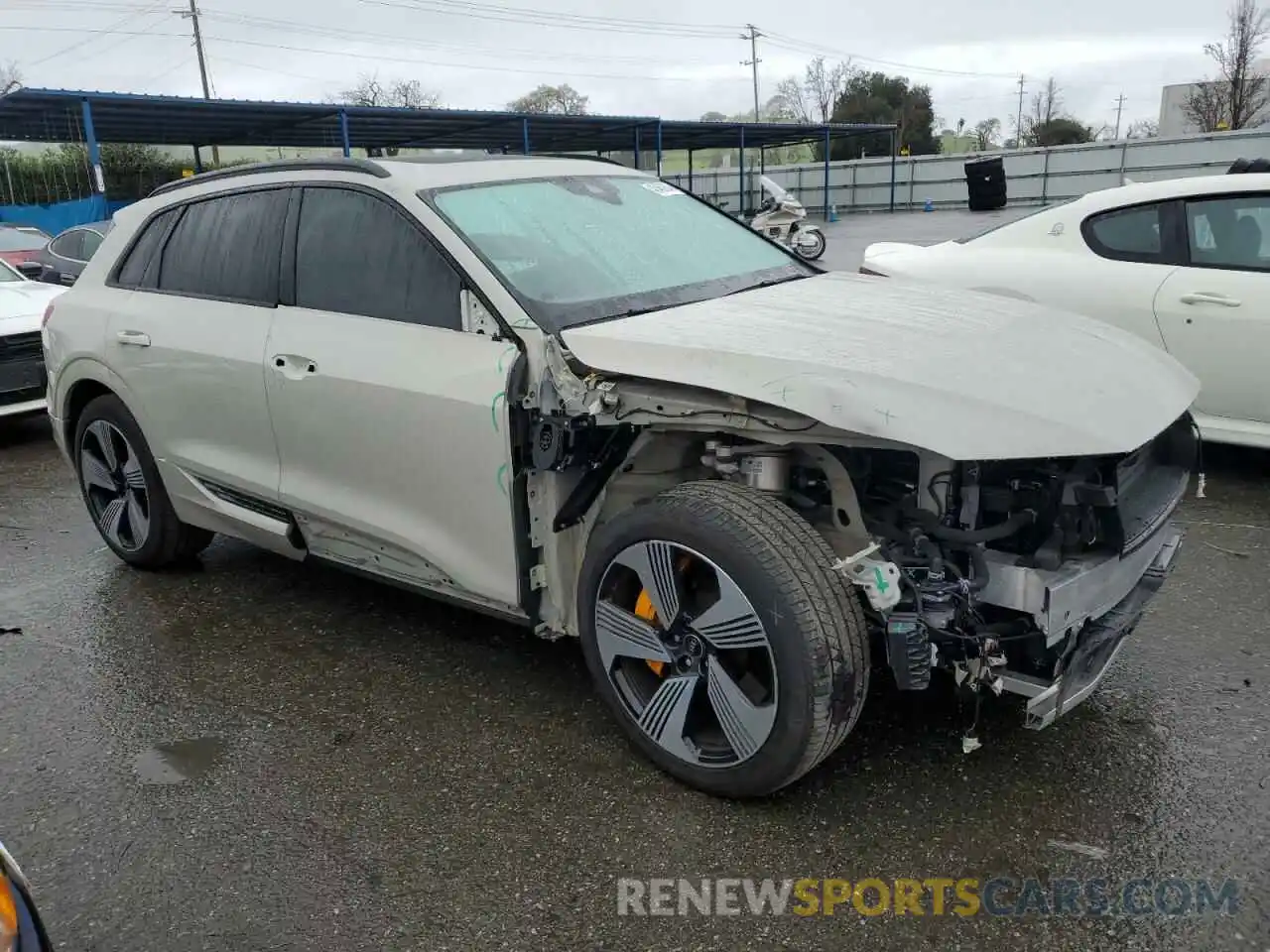 4 Photograph of a damaged car WA1LAAGE0NB008302 AUDI E-TRON 2022