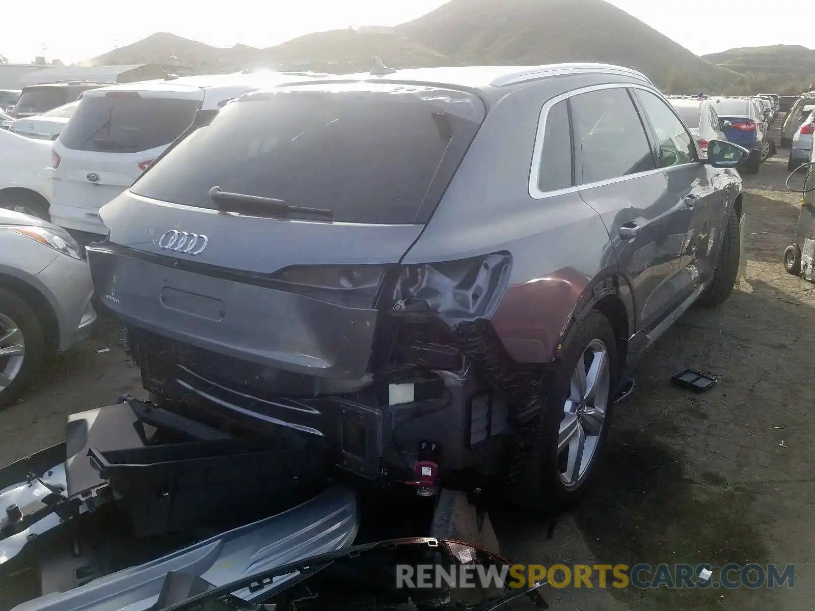 4 Photograph of a damaged car WA1LAAGE8KB010021 AUDI E-TRON PRE 2019