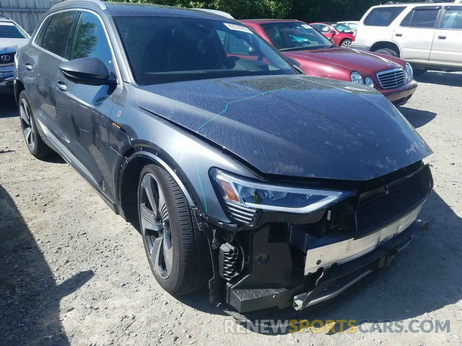 1 Photograph of a damaged car WA1VAAGE8KB005930 AUDI E-TRON PRE 2019