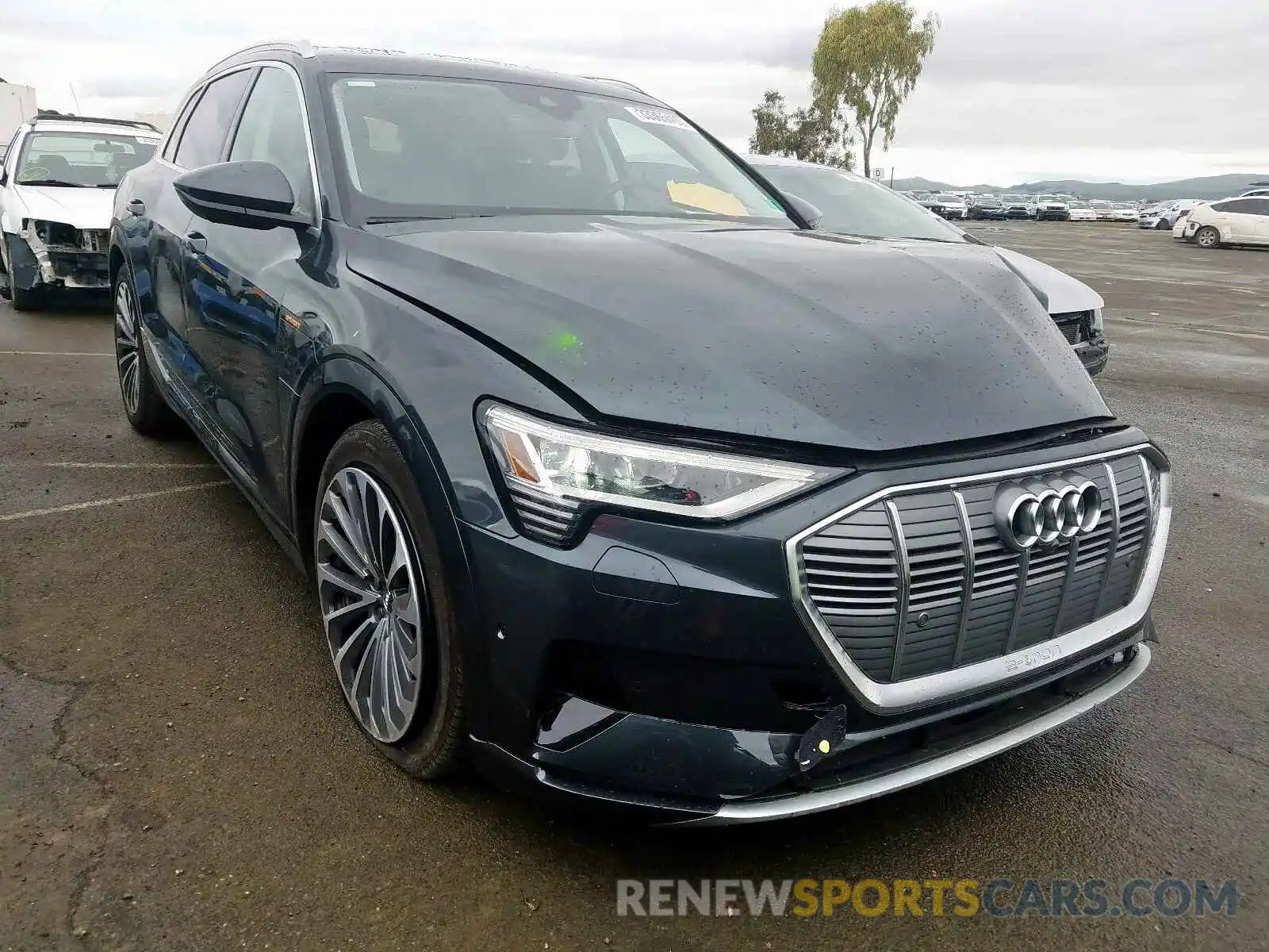 1 Photograph of a damaged car WA1VABGE1KB011431 AUDI E-TRON PRE 2019