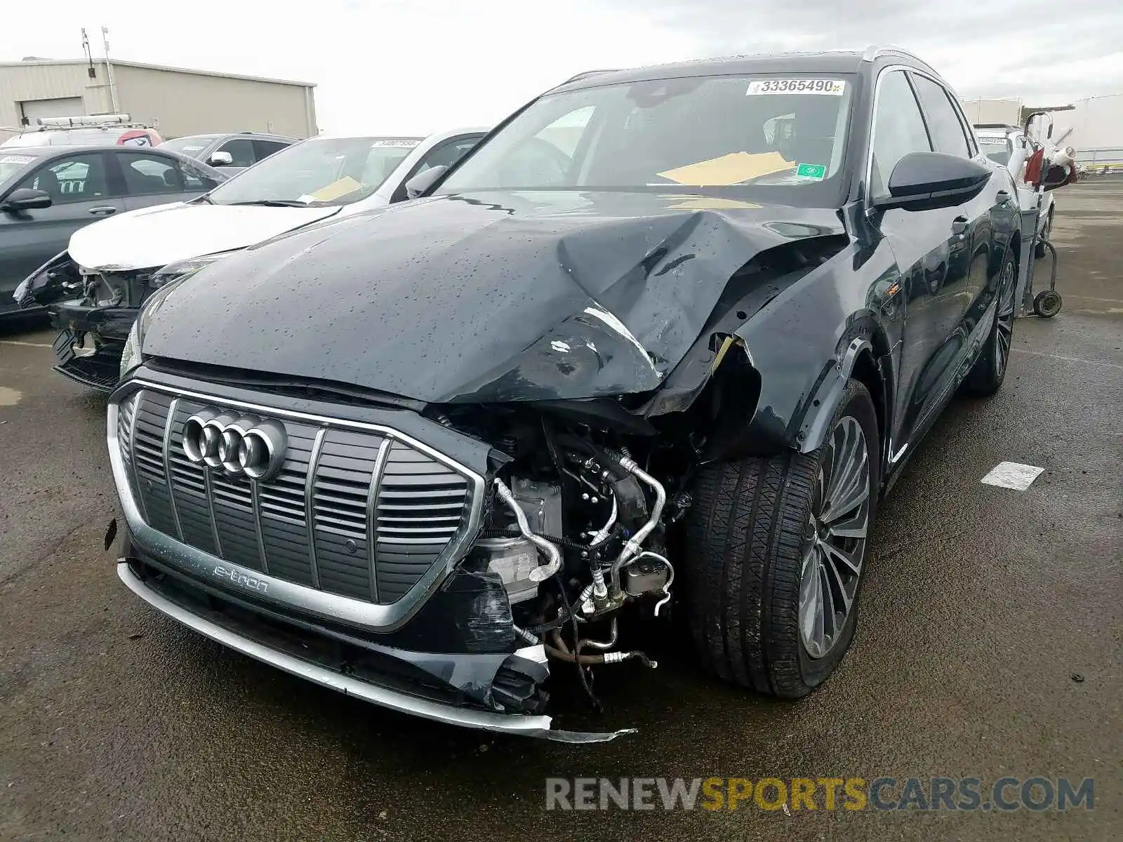 2 Photograph of a damaged car WA1VABGE1KB011431 AUDI E-TRON PRE 2019