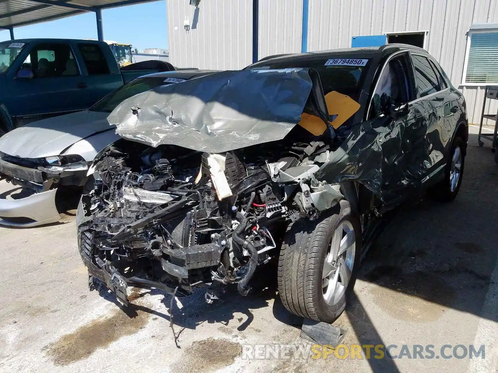 2 Photograph of a damaged car WA1AECF30K1077693 AUDI Q3 2019