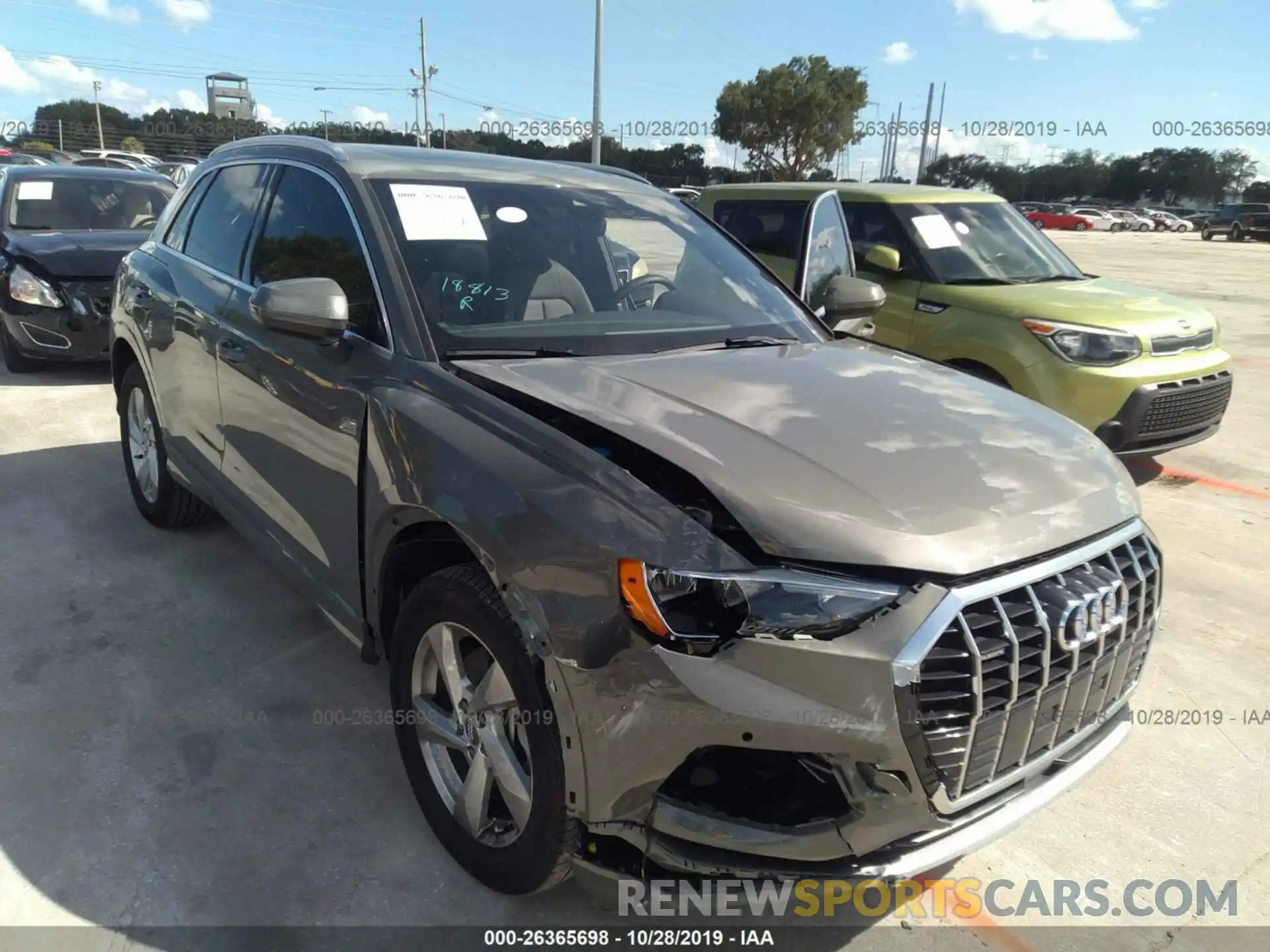 1 Photograph of a damaged car WA1AECF34K1067653 AUDI Q3 2019