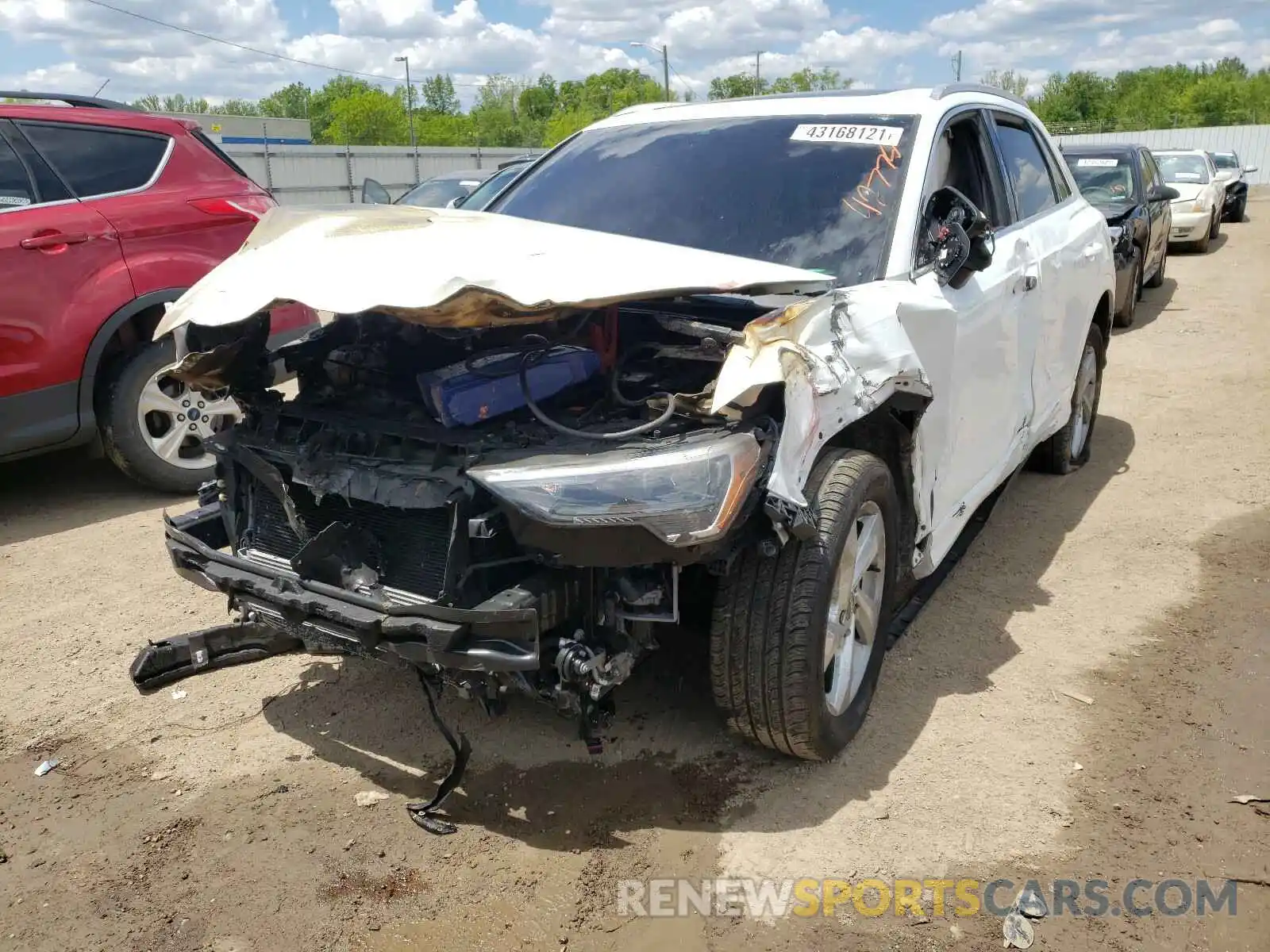 2 Photograph of a damaged car WA1AECF38K1077358 AUDI Q3 2019