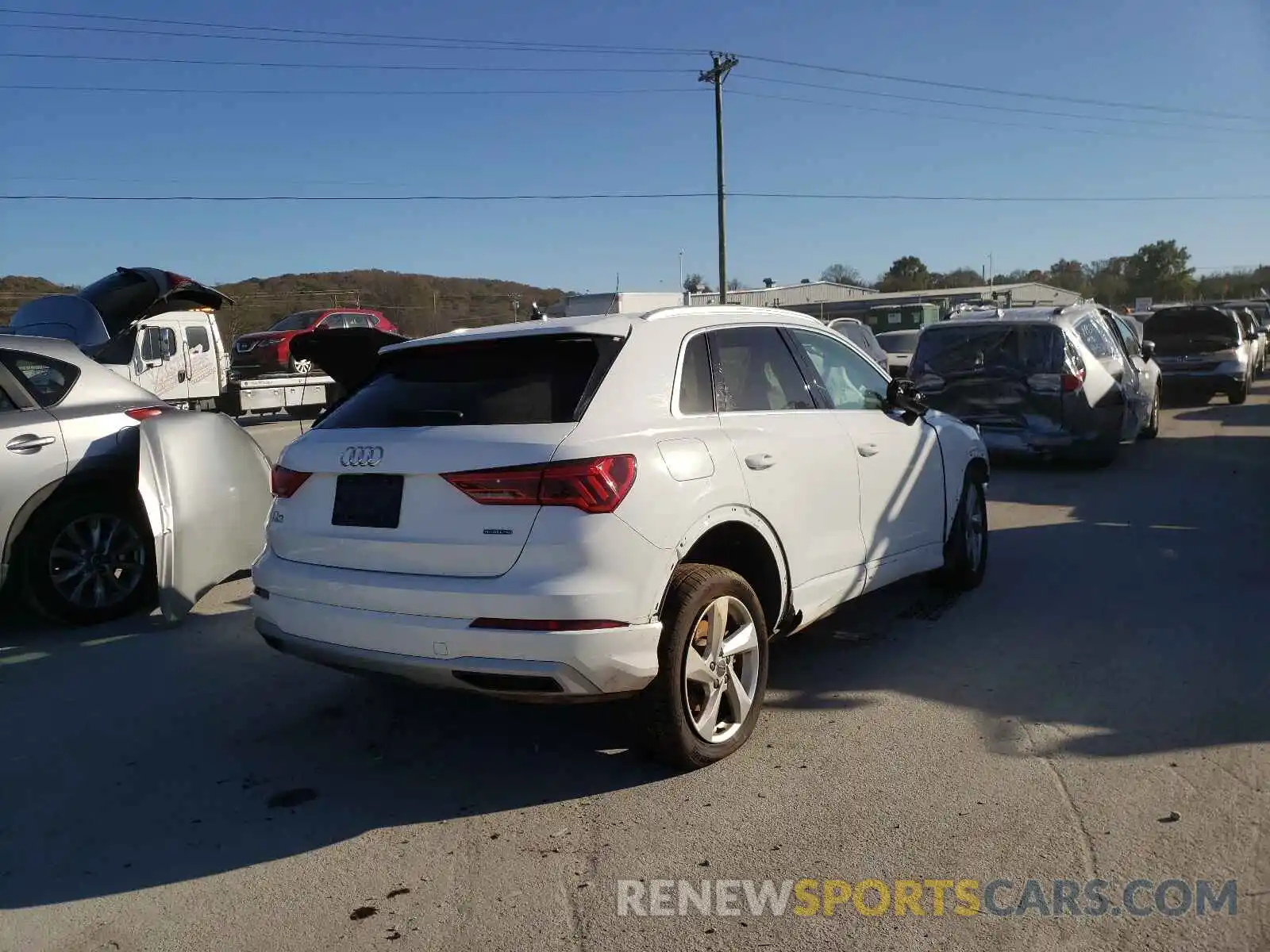 4 Photograph of a damaged car WA1AECF39K1084898 AUDI Q3 2019