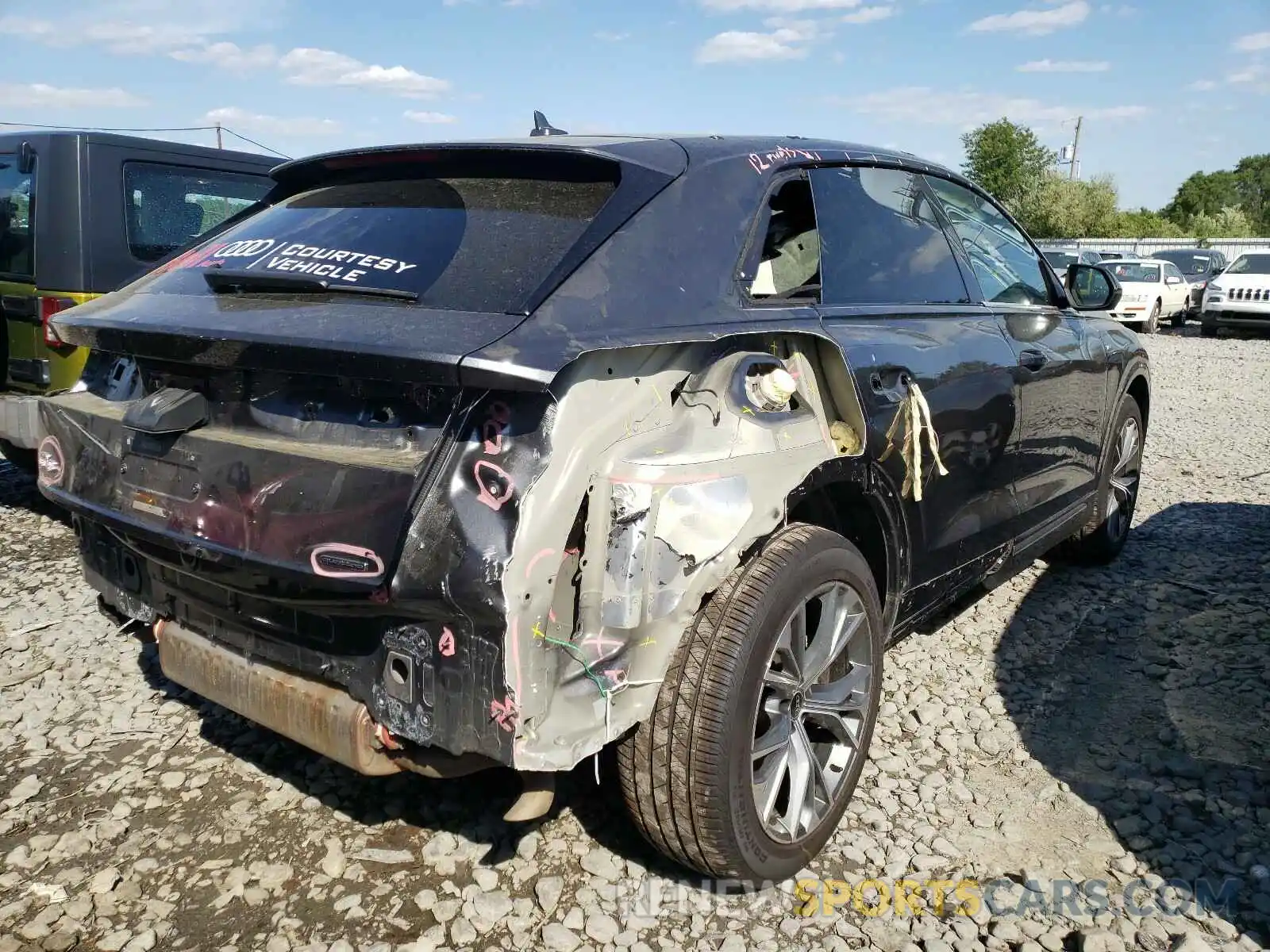 4 Photograph of a damaged car WA1EVAF17MD009039 AUDI Q8 2021