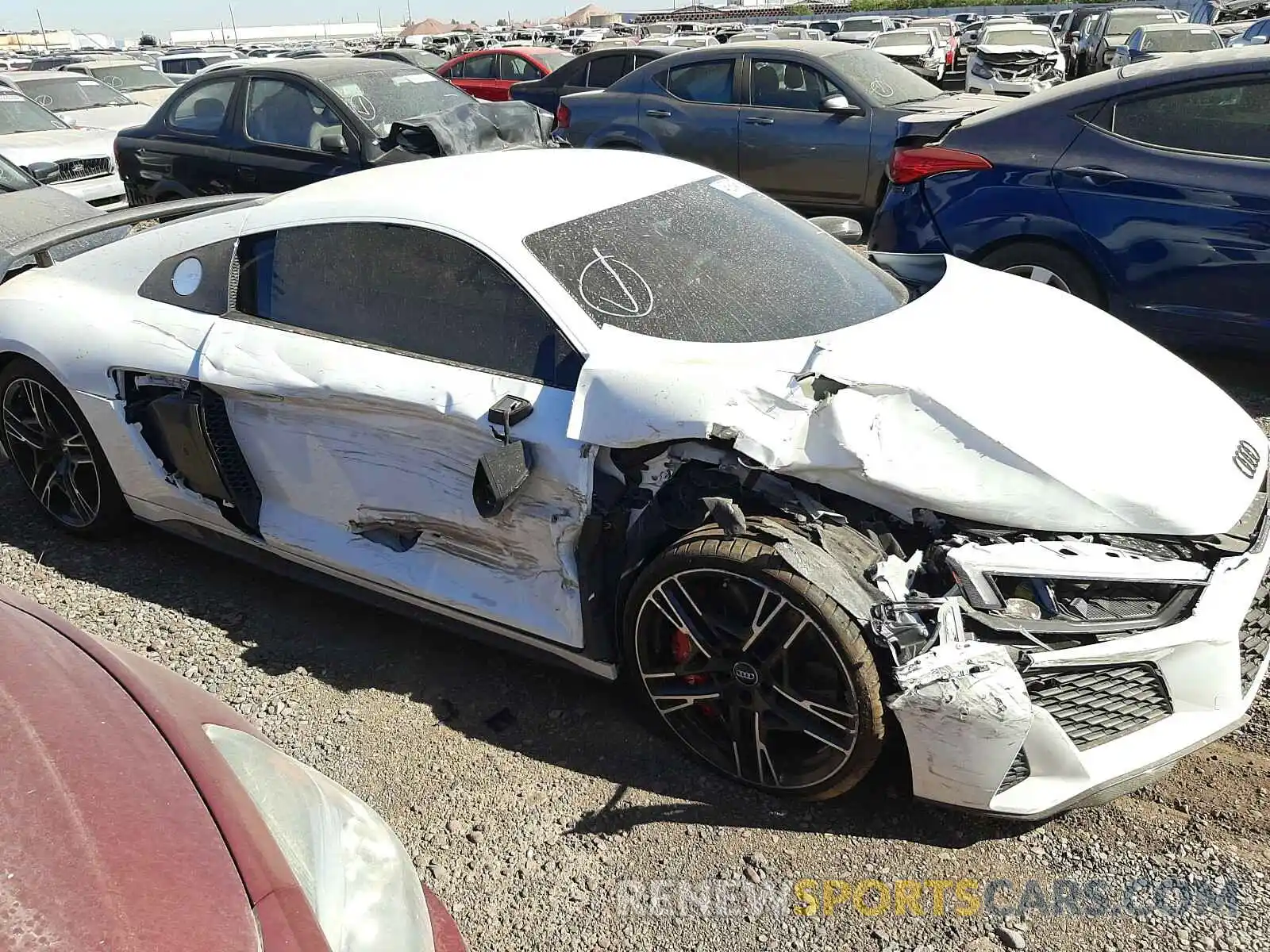 7 Photograph of a damaged car WUAKBAFX5L7900727 AUDI R8 2020