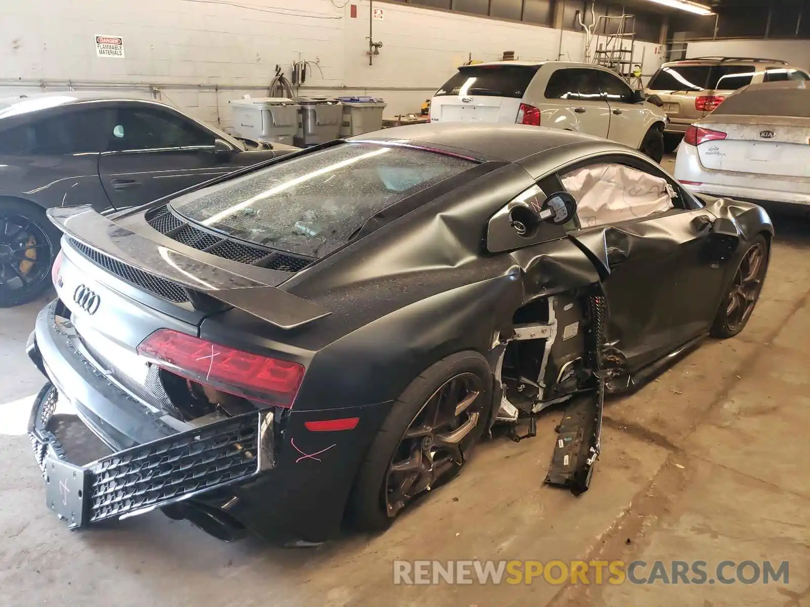 4 Photograph of a damaged car WUAKBAFX9L7900102 AUDI R8 2020