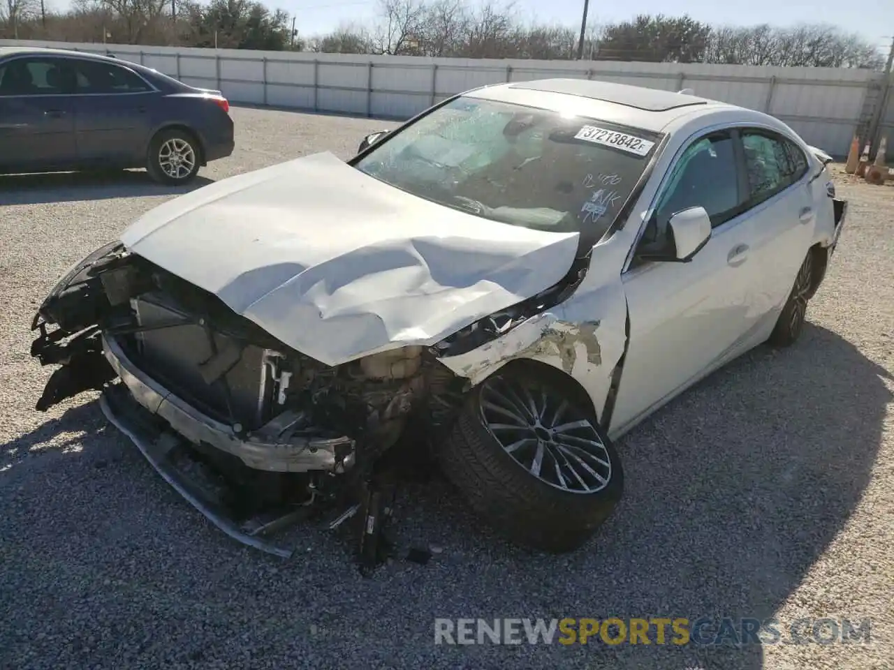 2 Photograph of a damaged car WBA73AK00L7F82069 BMW 2 SERIES 2020