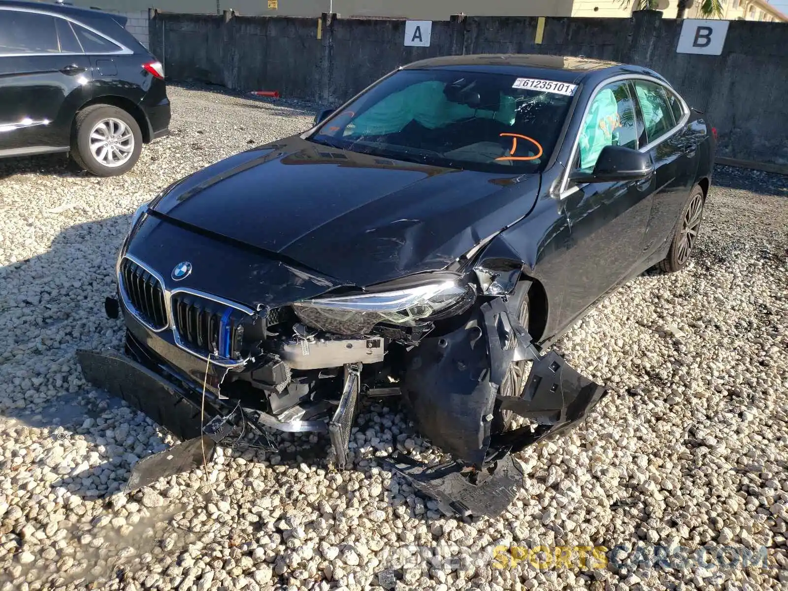 2 Photograph of a damaged car WBA53AK03M7J51778 BMW 2 SERIES 2021