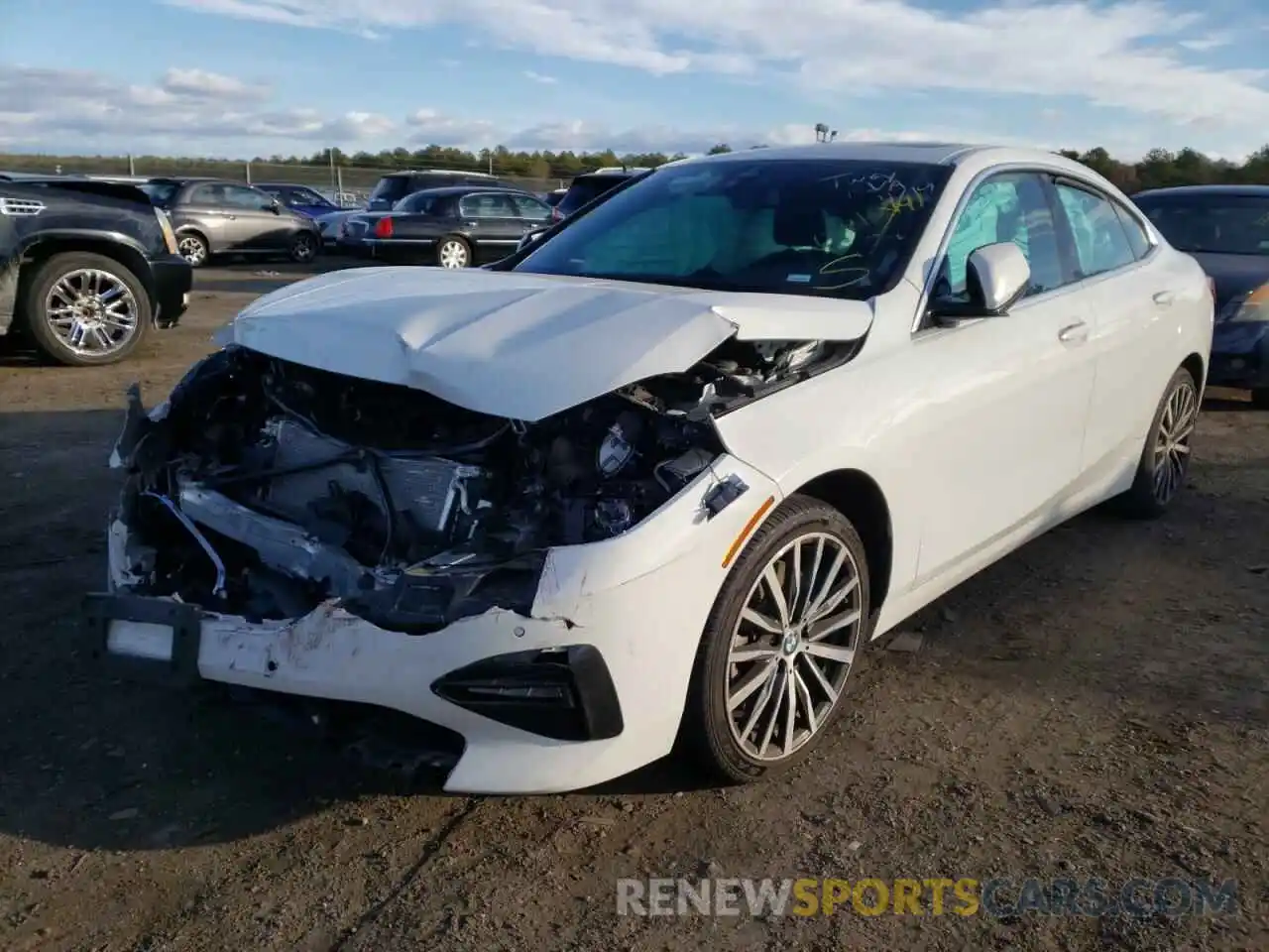 2 Photograph of a damaged car WBA73AK0XM7H58336 BMW 2 SERIES 2021