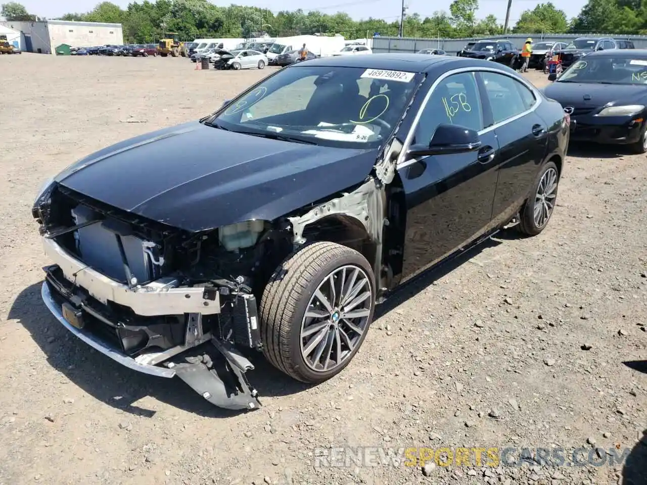 2 Photograph of a damaged car WBA73AK0XM7J28409 BMW 2 SERIES 2021