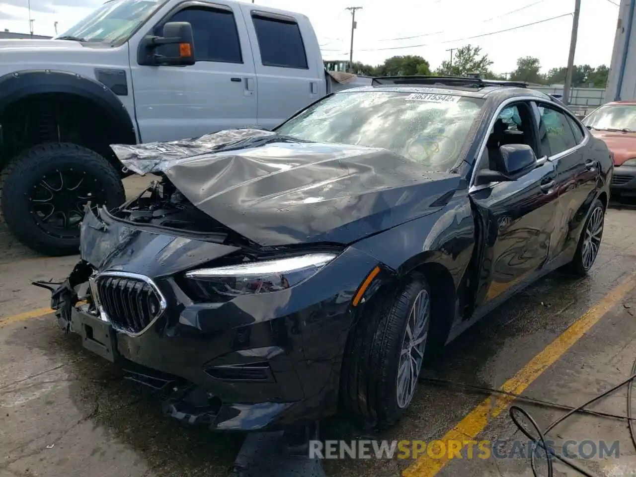 2 Photograph of a damaged car WBA73AK09N7K90405 BMW 2 SERIES 2022