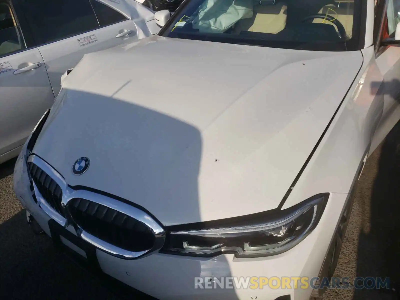 7 Photograph of a damaged car WBA5R1C50KAJ99778 BMW 3 SERIES 2019