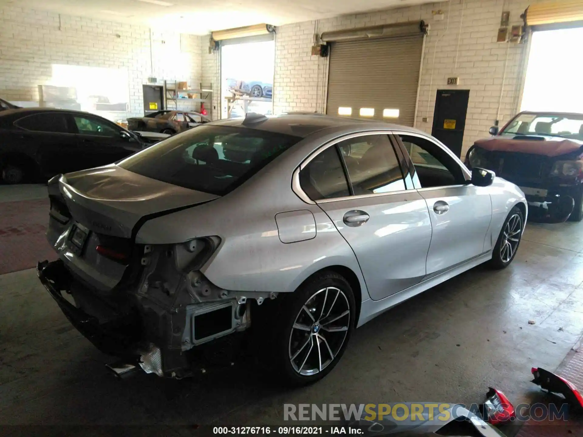 4 Photograph of a damaged car WBA5R1C50KAK11444 BMW 3 SERIES 2019