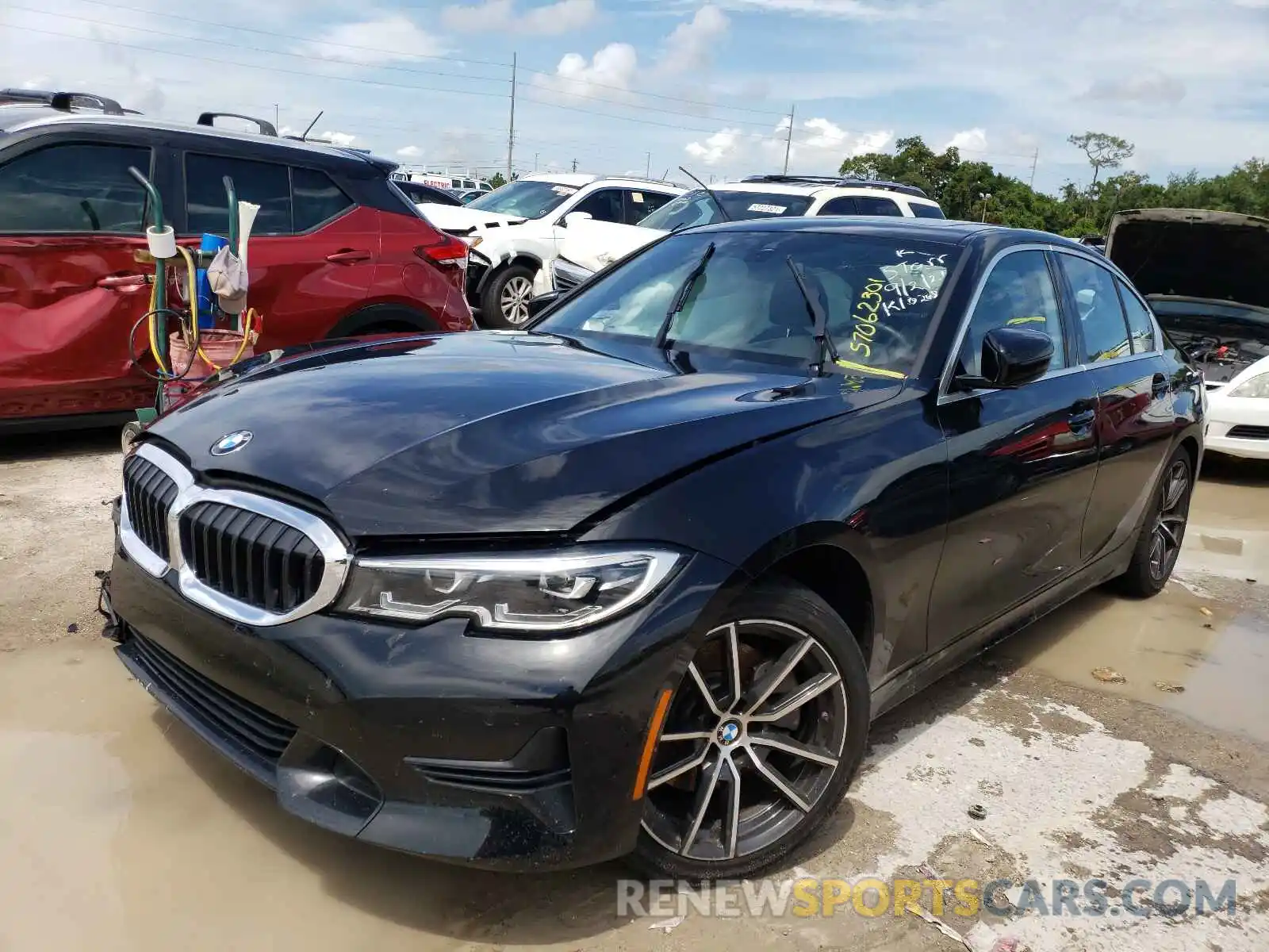 2 Photograph of a damaged car WBA5R1C51KAK10268 BMW 3 SERIES 2019