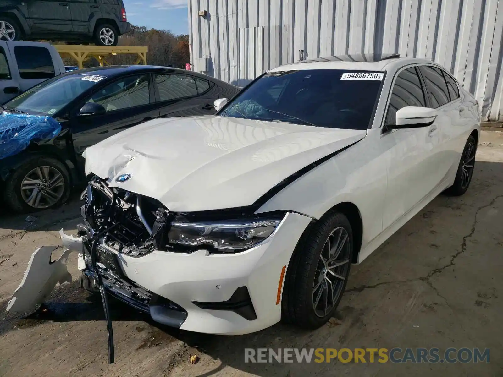 2 Photograph of a damaged car WBA5R1C51KAK11145 BMW 3 SERIES 2019