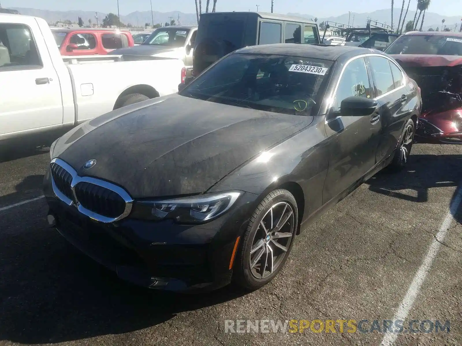 2 Photograph of a damaged car WBA5R1C51KAK11291 BMW 3 SERIES 2019