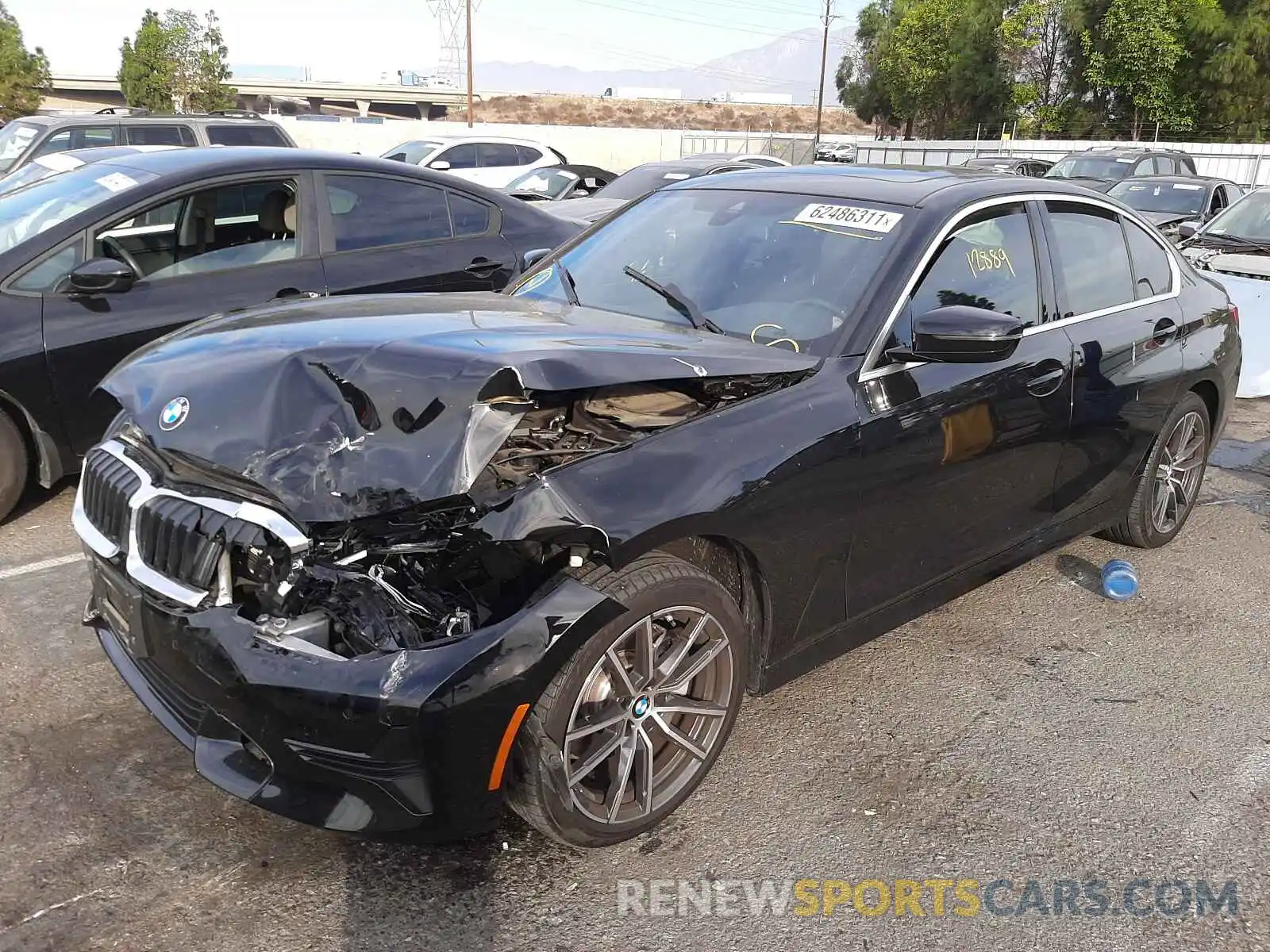 2 Photograph of a damaged car WBA5R1C51KAK11825 BMW 3 SERIES 2019